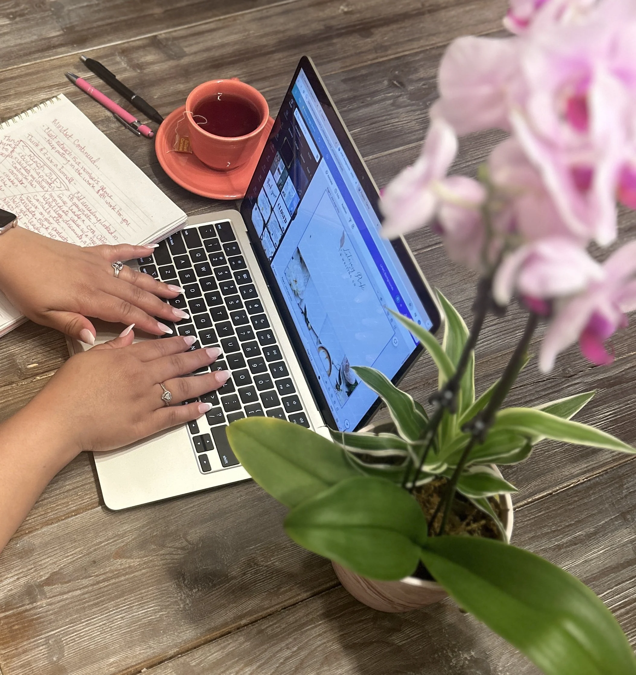 Notebook and coffee cup on a desk