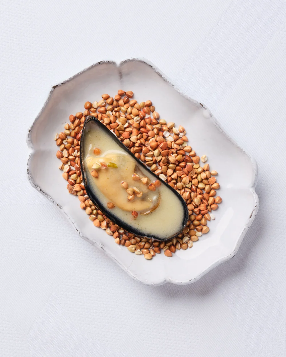 Mussel with lentils at Sketch - photograph by Claude Okamoto