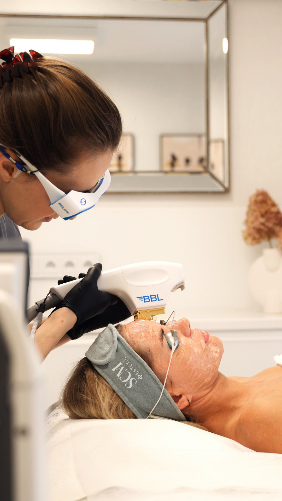 BroadBand Light facial treatment with protective eyewear