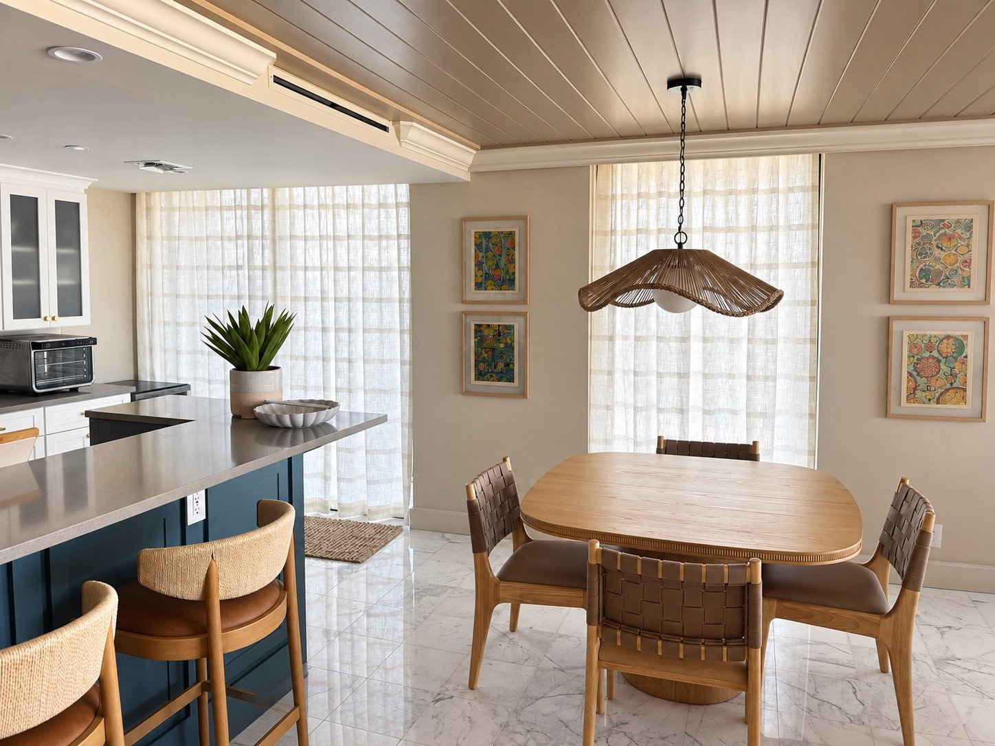 Light sheer treatment across kitchen and dining room windows