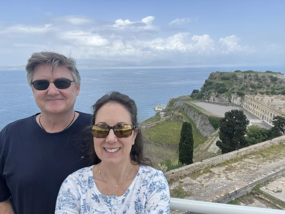 Becky and Mark overlooking the sea in Corfu