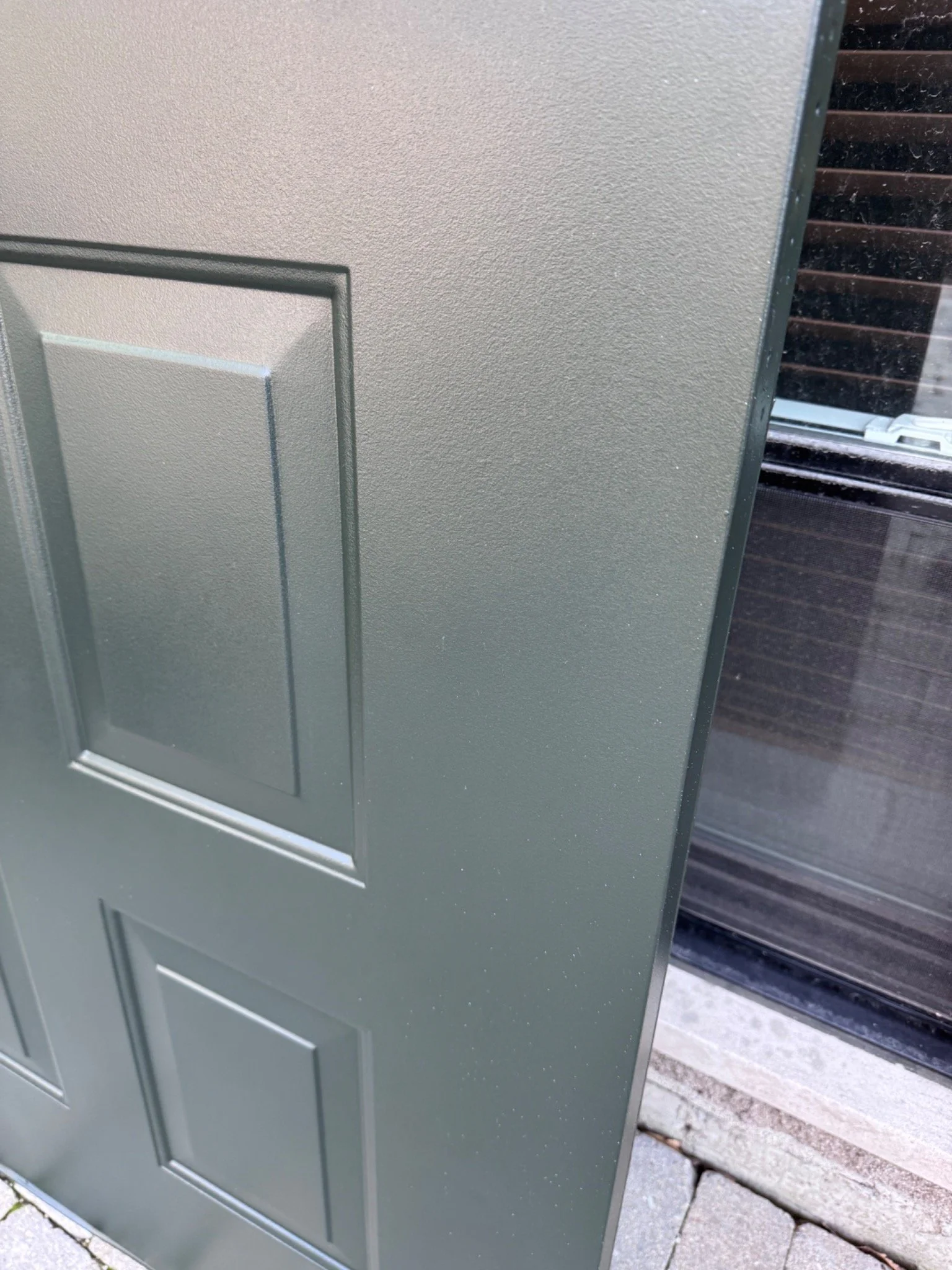Finished deep green entry doors