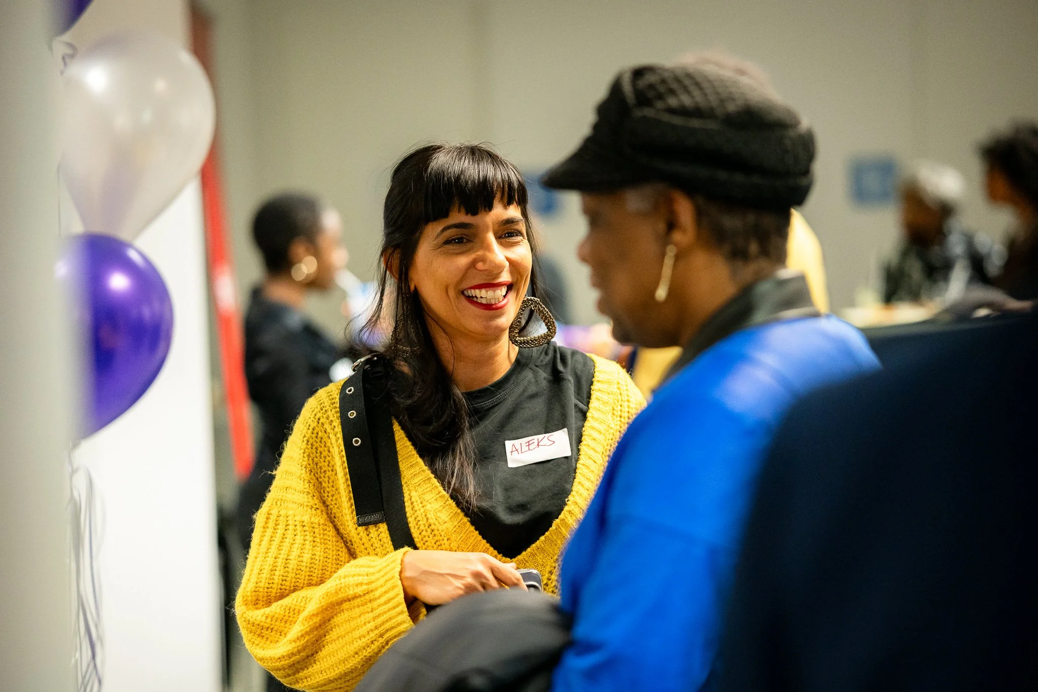 Guests connecting during the community gathering.