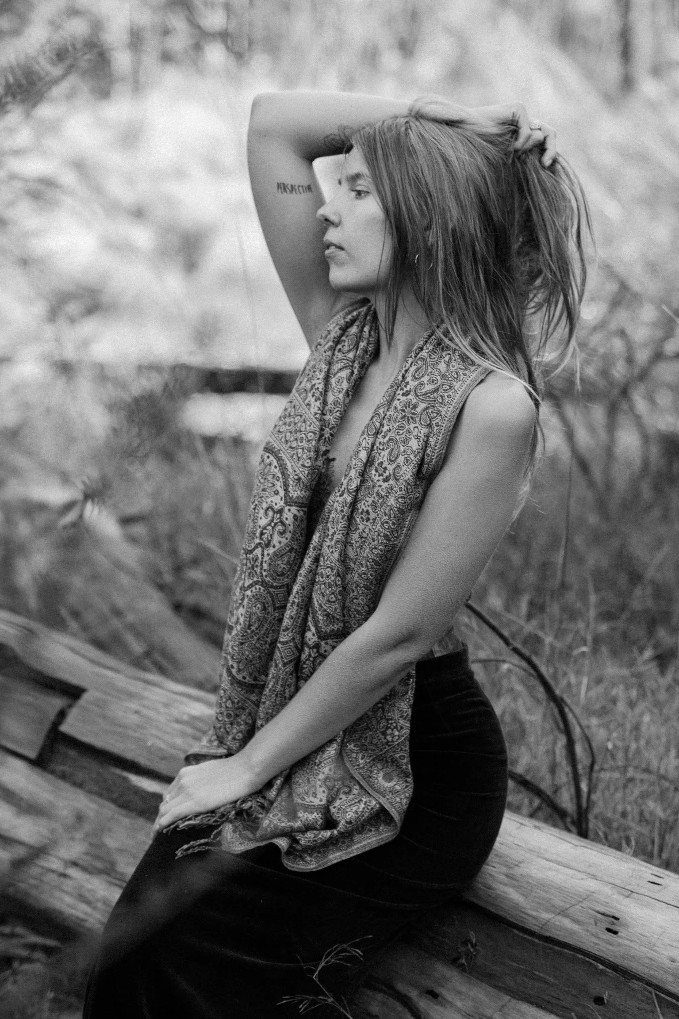 Black-and-white portrait of Jade McWilliam outdoors