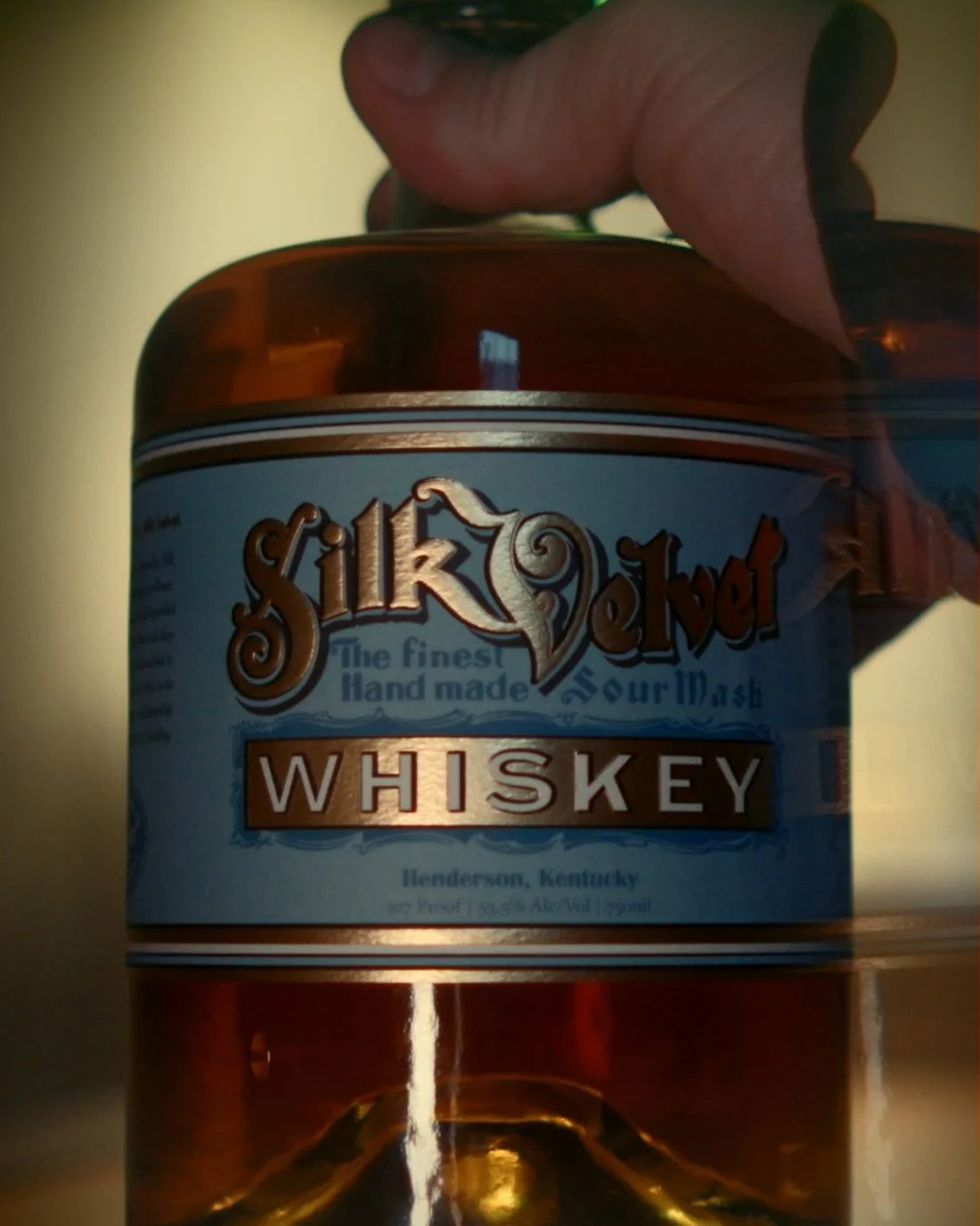Single Barrel held to the light