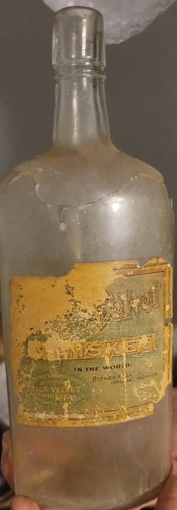 Bottle With Worn Label