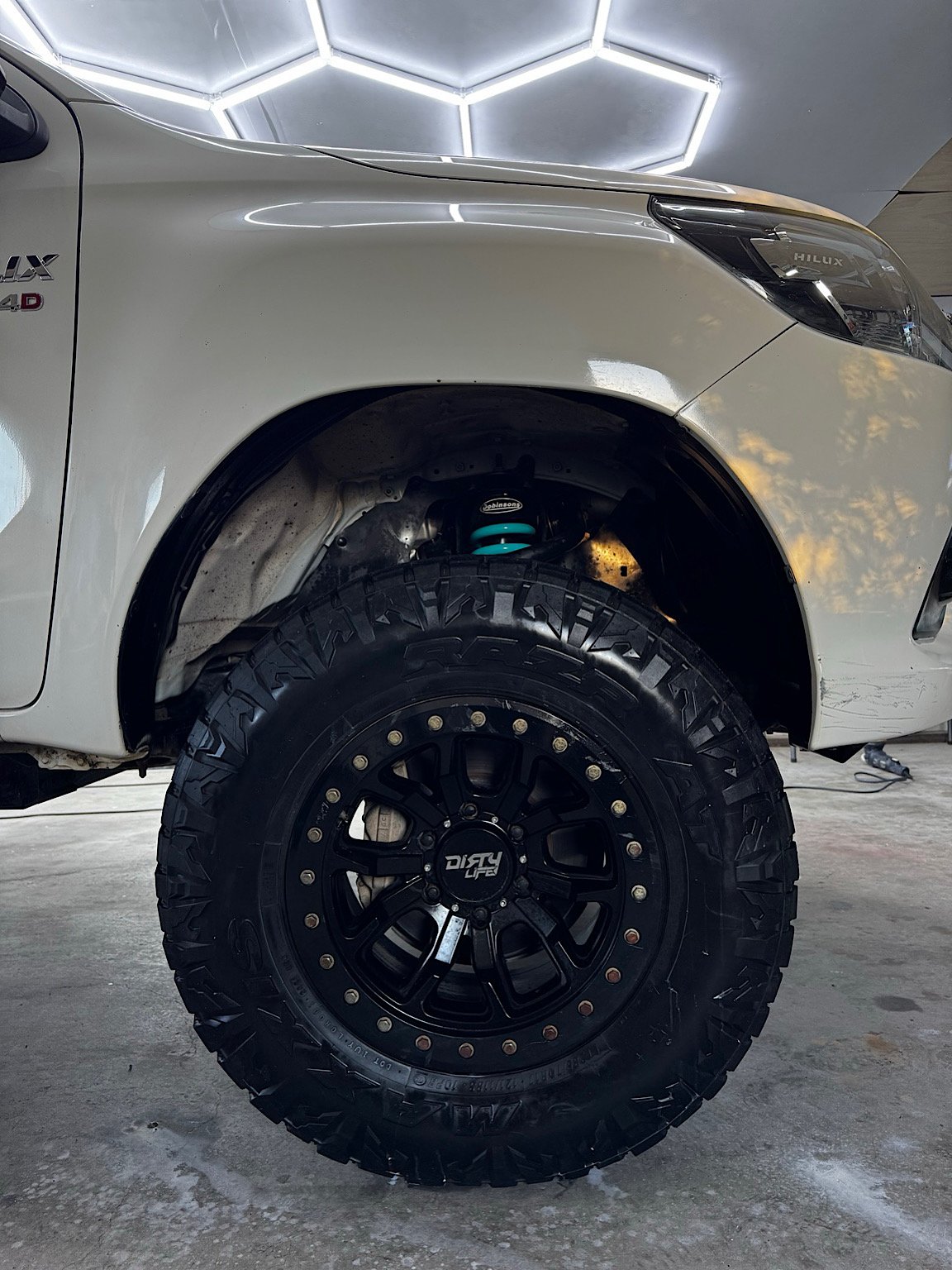 Toyota Hilux wheel tyre and wheel arch after detailed cleaning