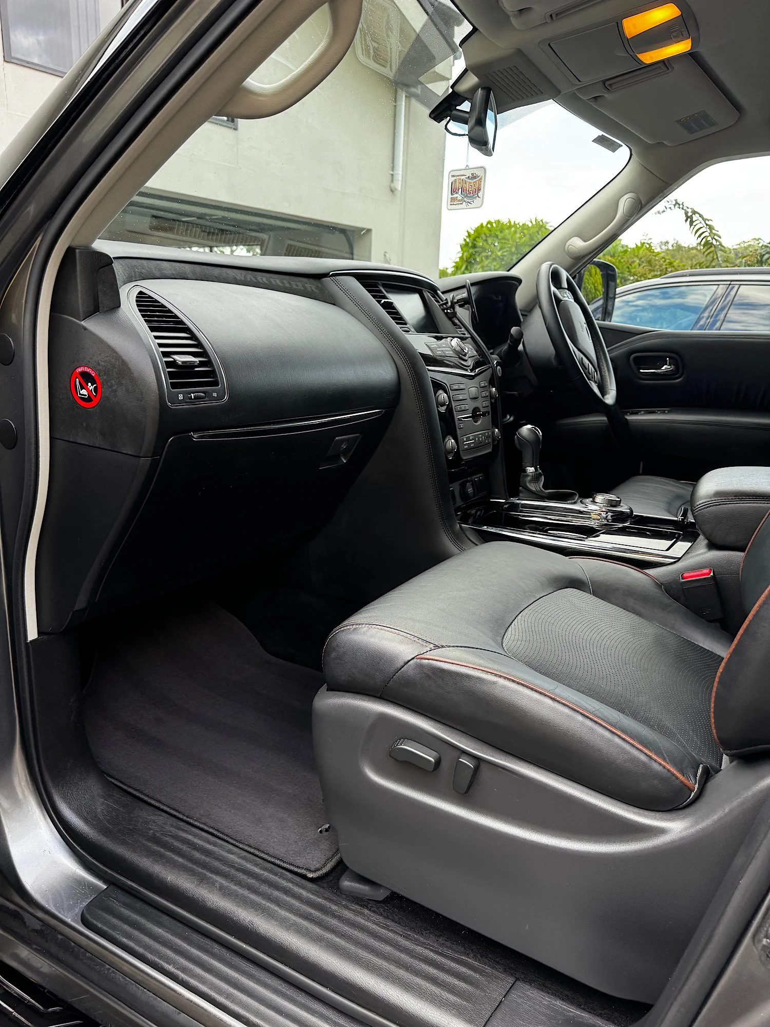 Clean front interior of Nissan Patrol Warrior after extended detail