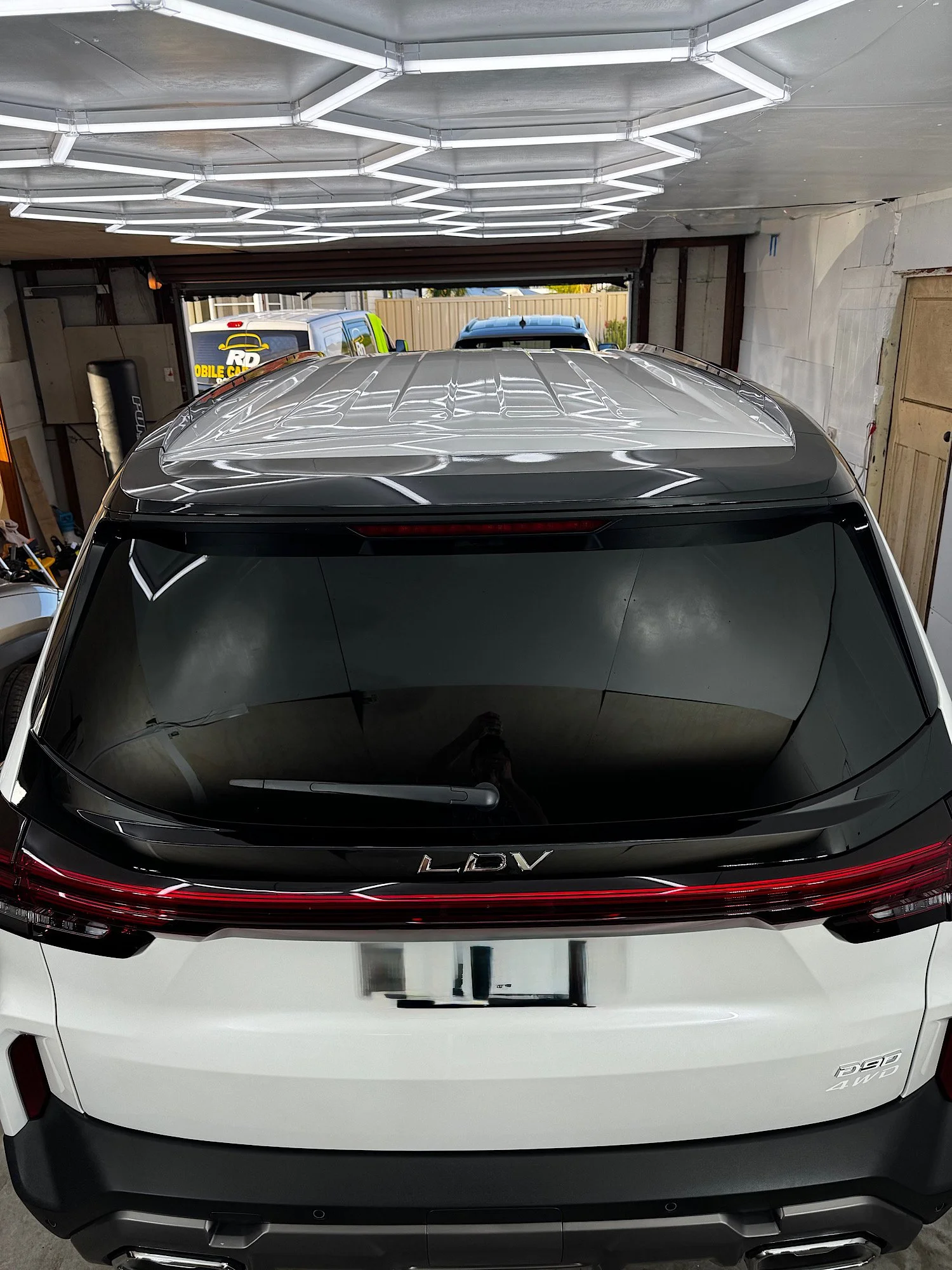 Roof and rear of a white 2026 LDV D90 showing paintwork reflections after ceramic coating