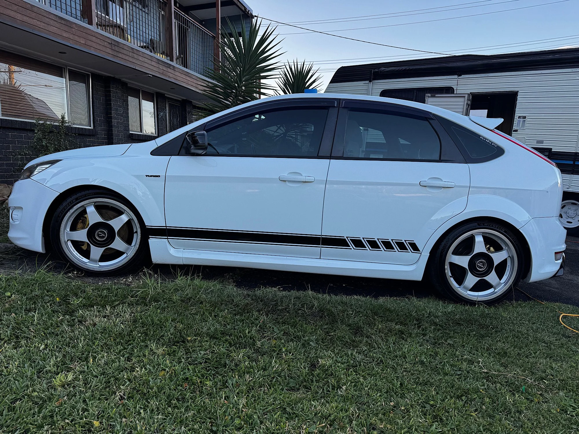 2010 Ford Focus XR5 Turbo after an extended interior and exterior detail with custom side decal installation in Gwandalan NSW by RD Mobile Car Detailing.