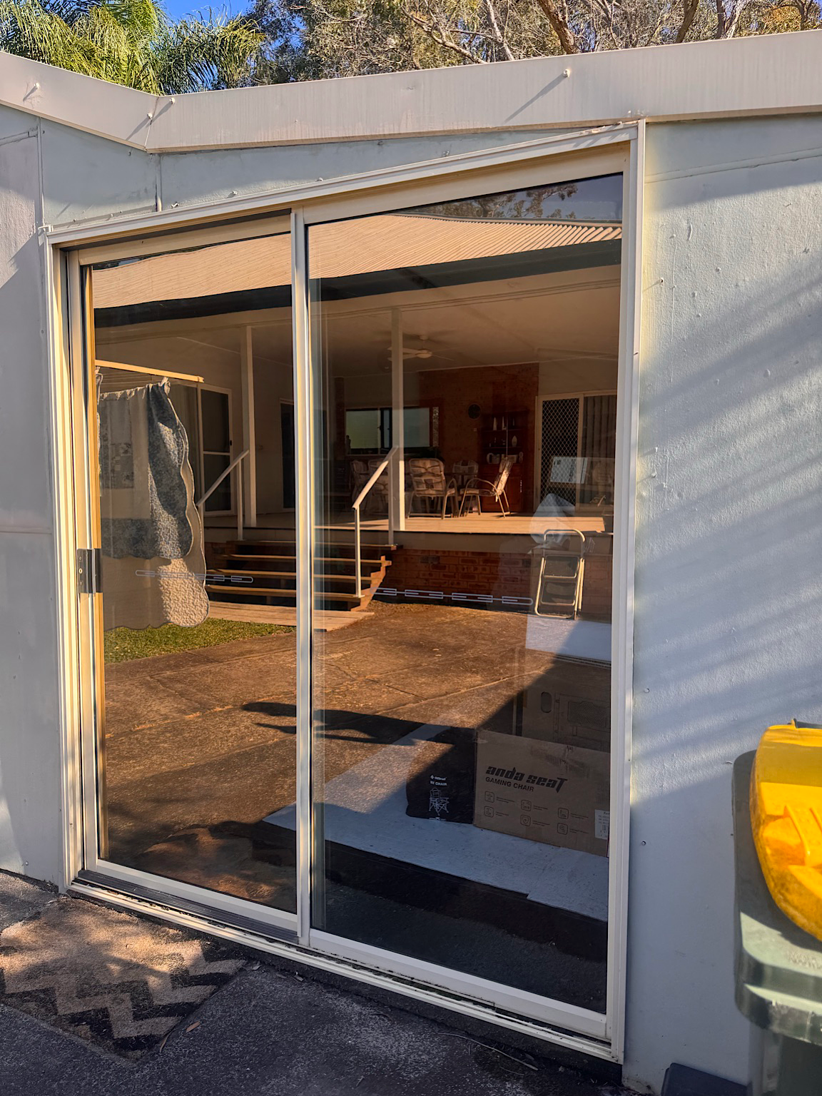 Shed sliding door after Low-E window tint installation improving privacy and reducing heat Central Coast NSW
