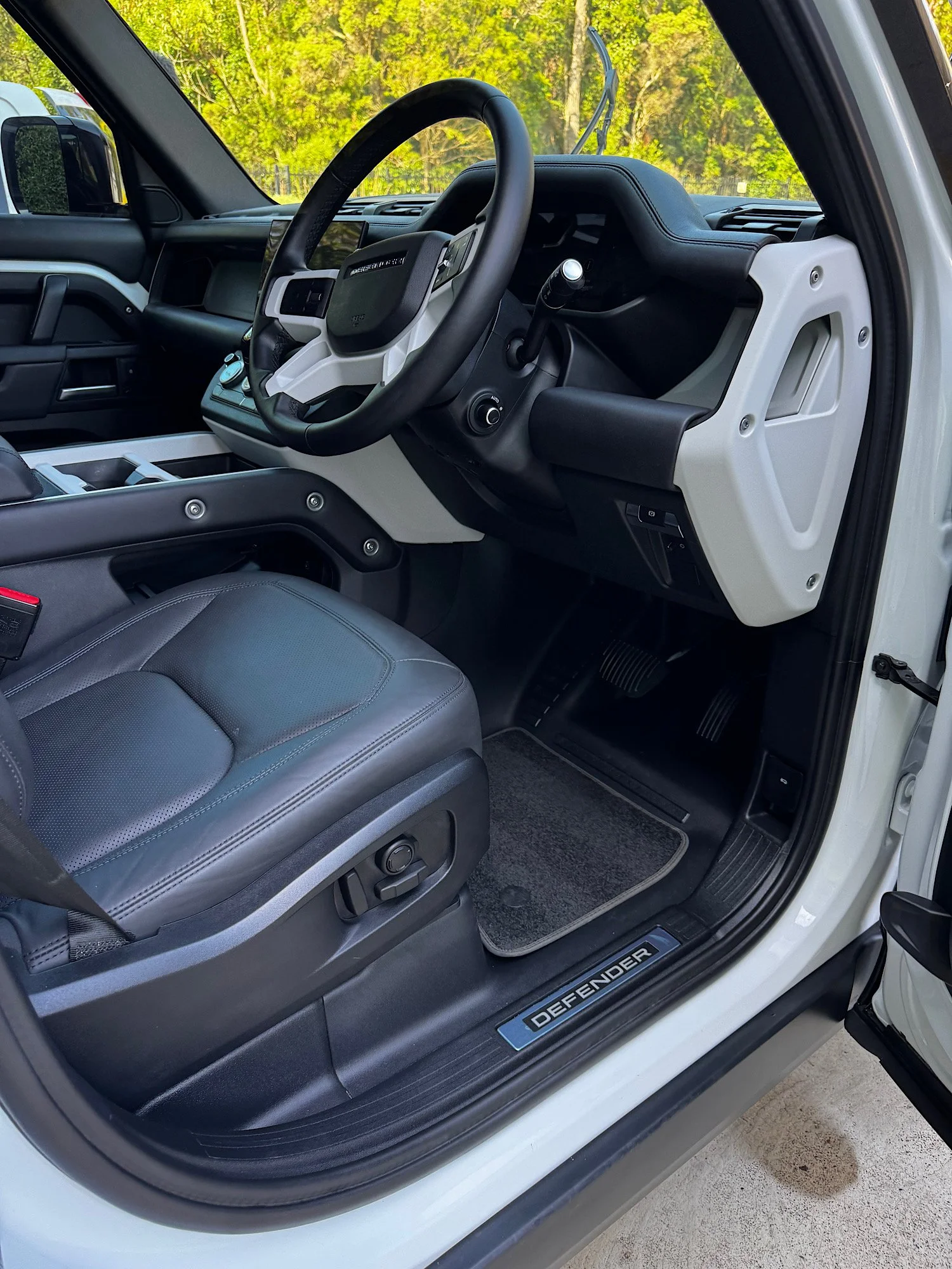 Land Rover Defender driver area interior detail clean dashboard and seat