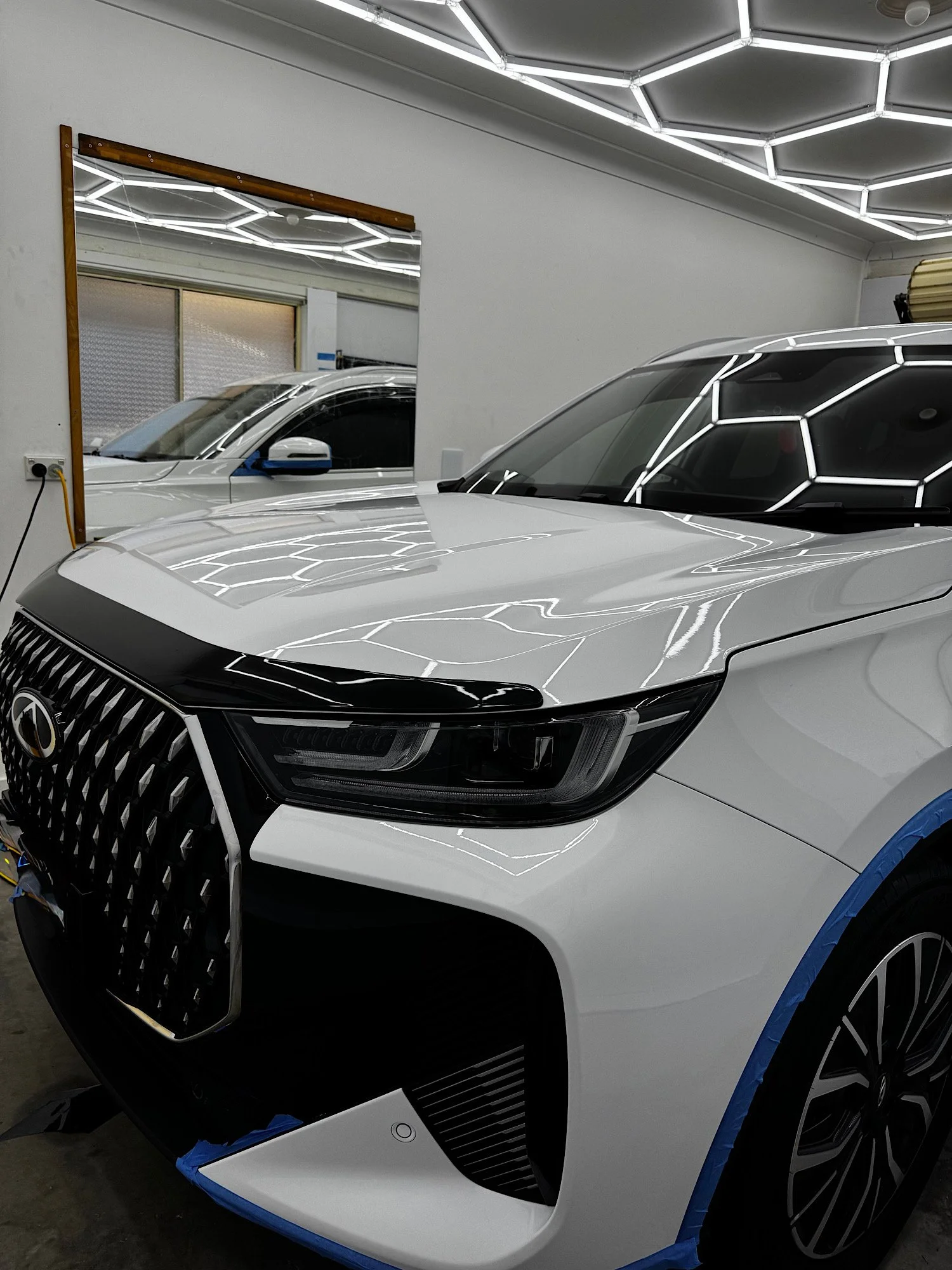 Chery Tiggo 7 ceramic coating finish inside studio with high gloss reflections Central Coast NSW