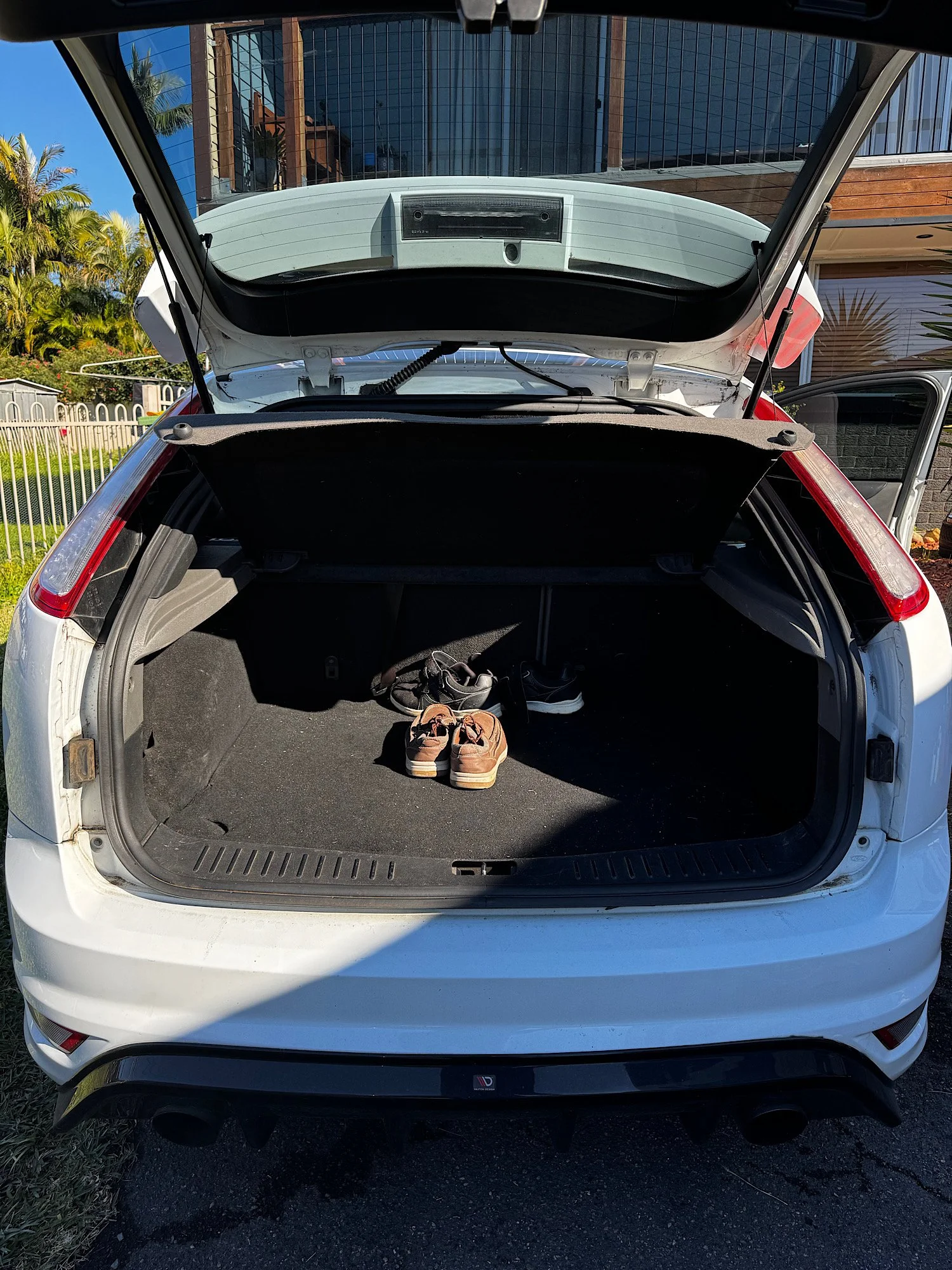 Boot area before vacuuming and cleaning on a Ford Focus XR5 Turbo.