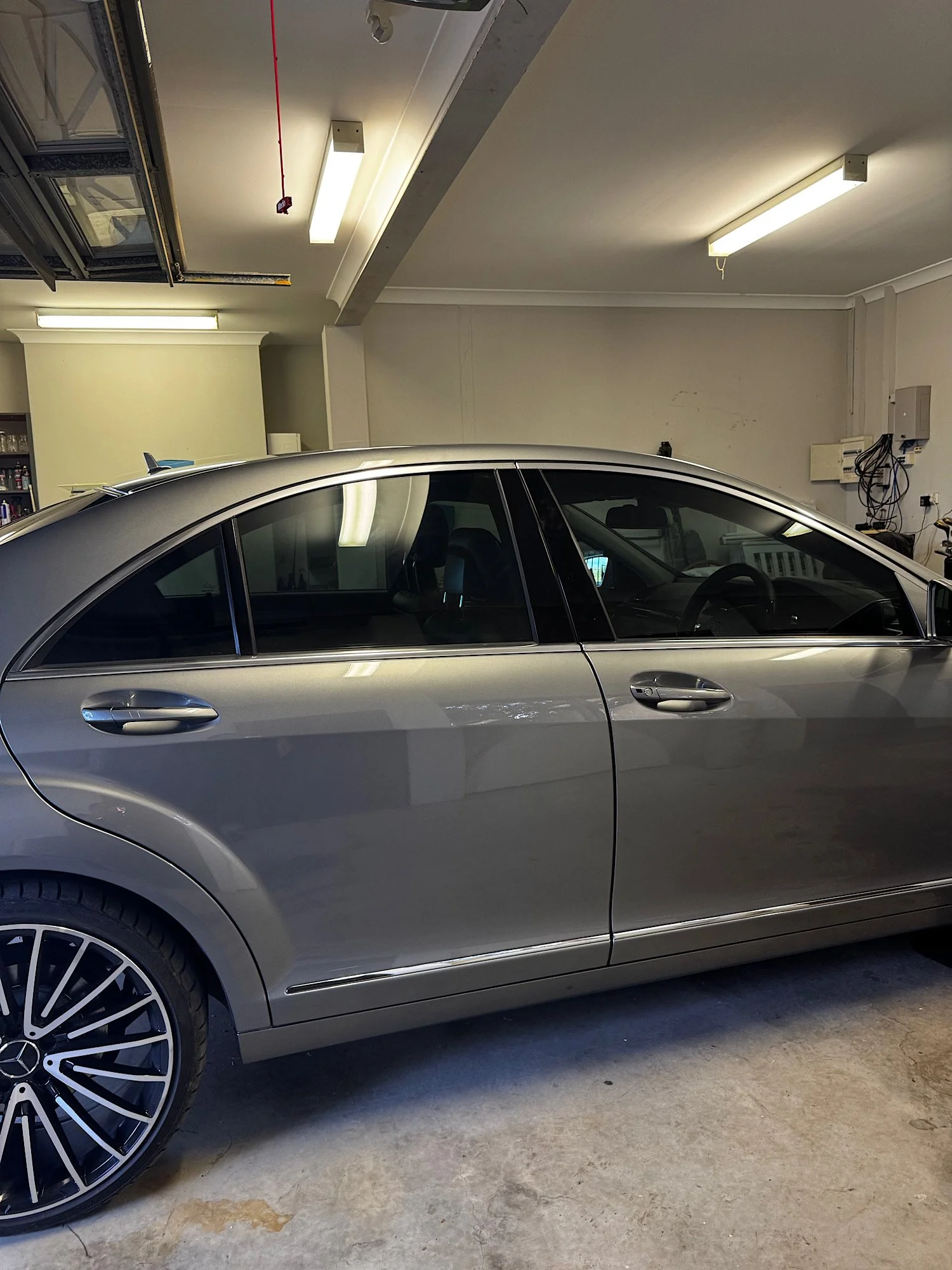 Close-up side view of Mercedes-Benz S350 window tint finish