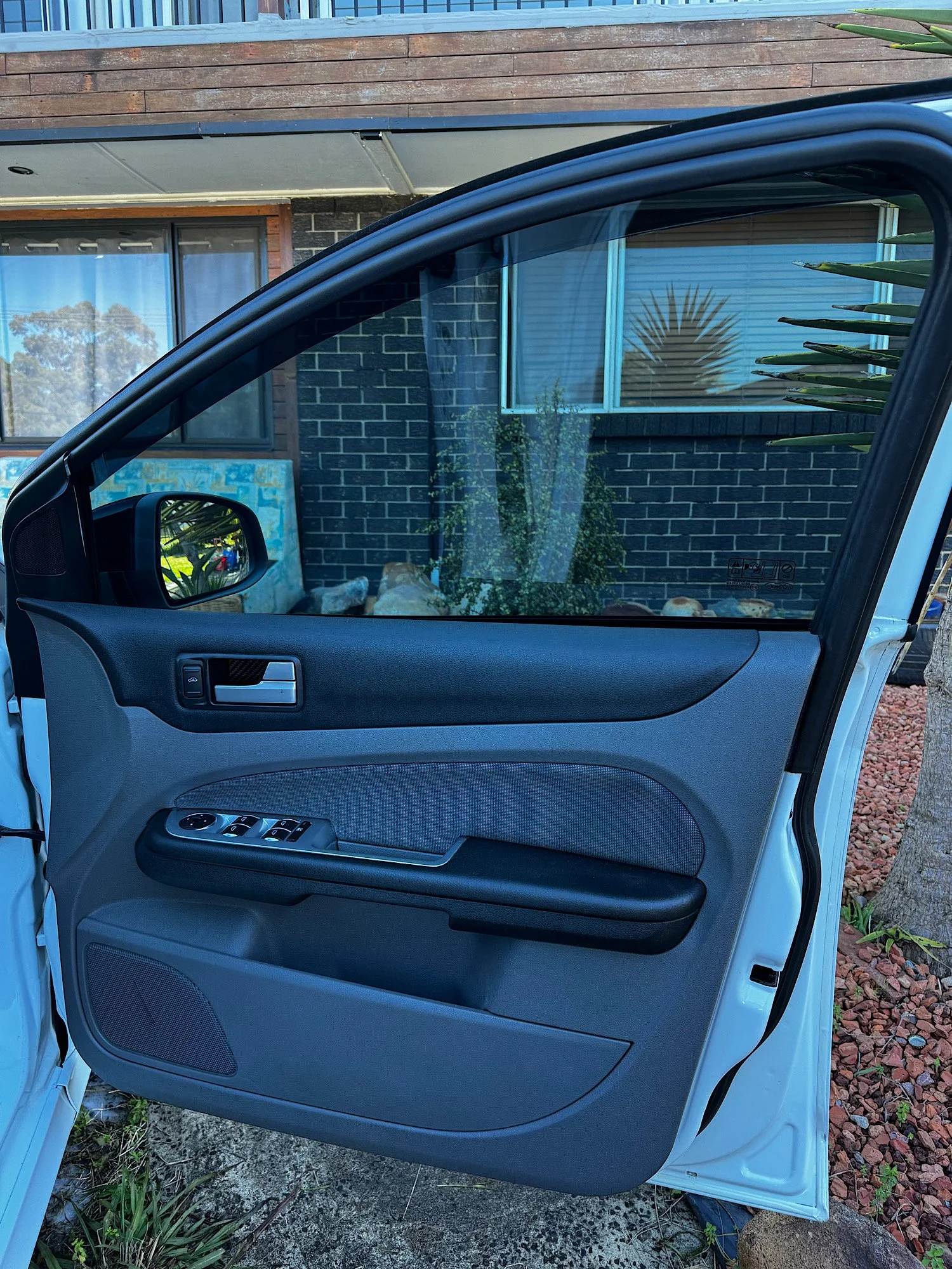 Driver door trim after deep cleaning and dressing on a Ford Focus XR5 Turbo.