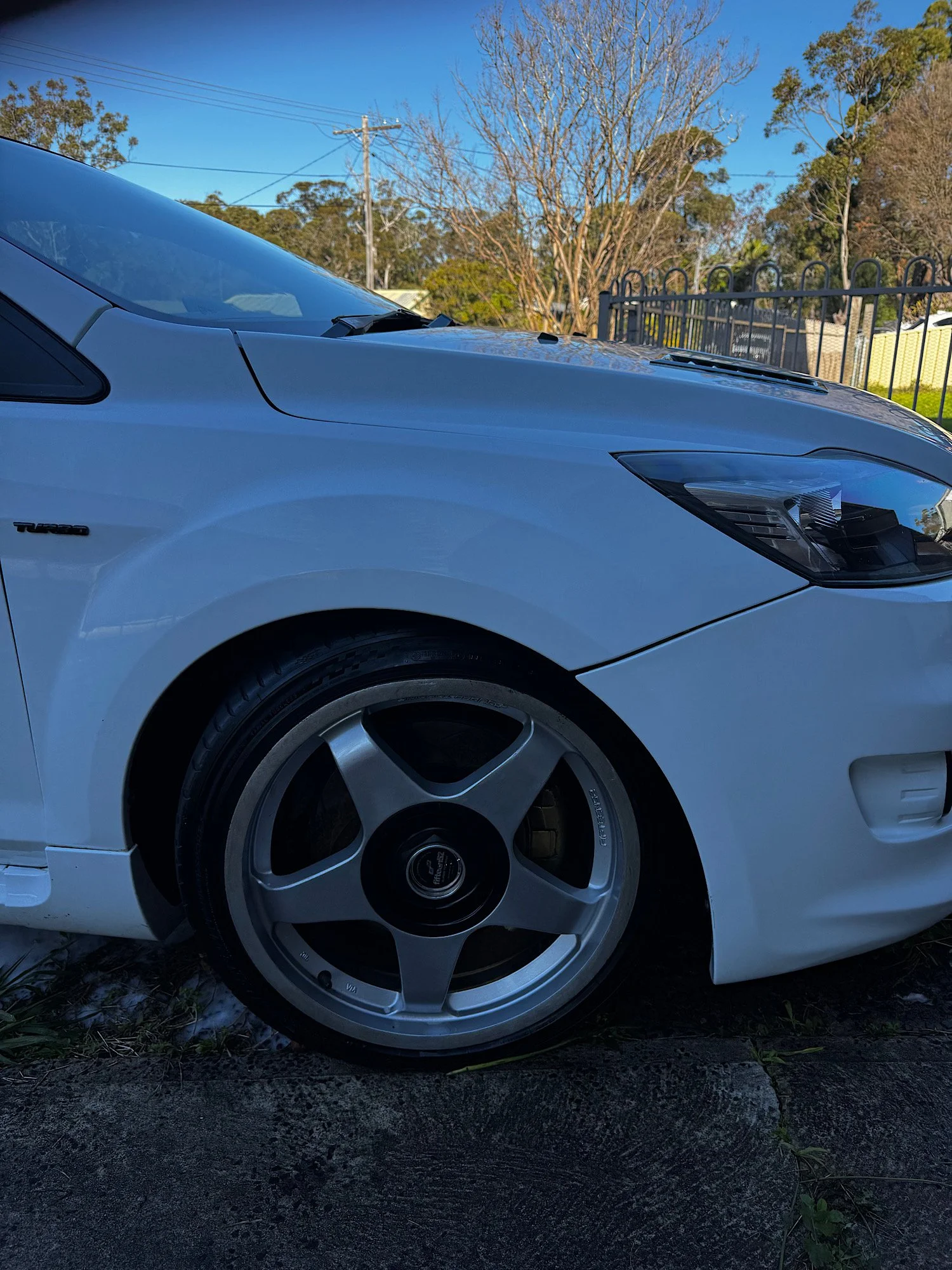 Cleaned alloy wheel and dressed tyre after an extended detailing service on a Ford Focus XR5 Turbo.