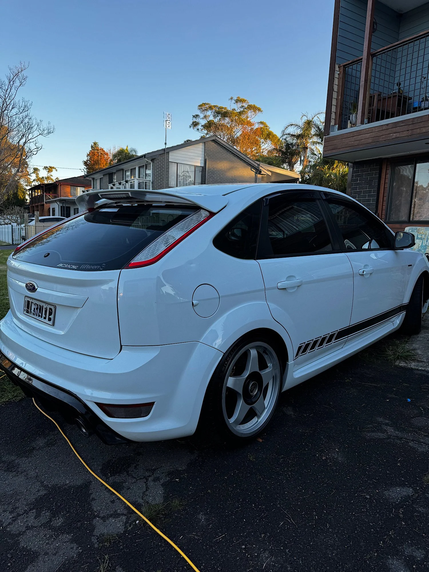 Rear exterior of a 2010 Ford Focus XR5 Turbo after an extended detailing service completed in Gwandalan NSW.