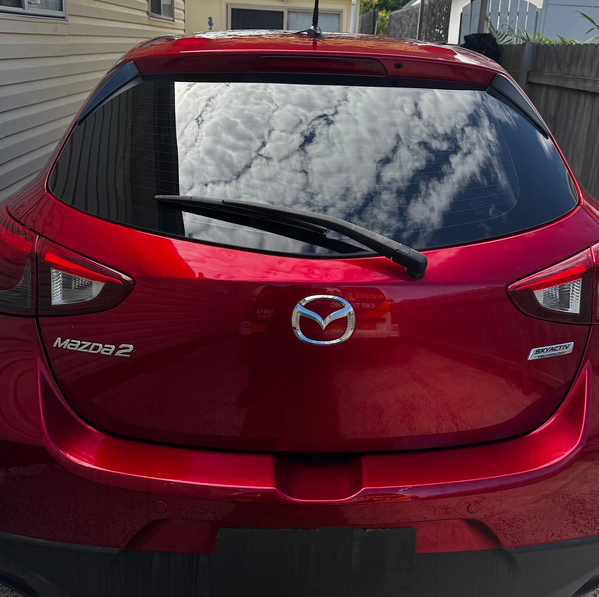Mazda 2 Neo rear window tint after installation clean finish Central Coast NSW