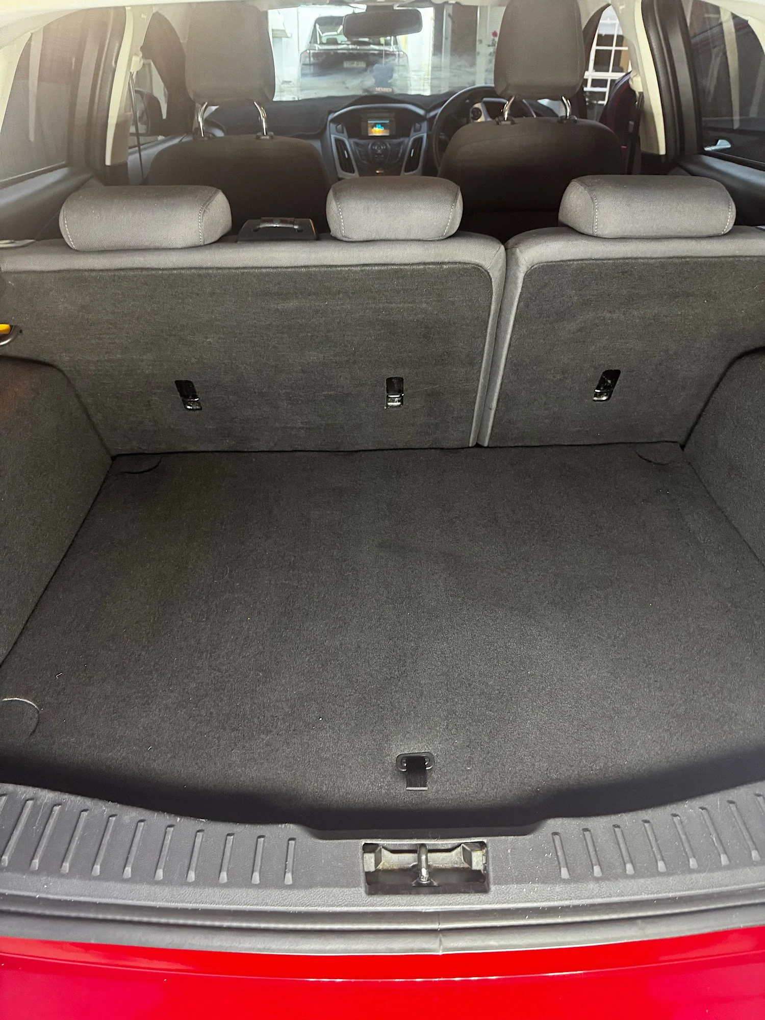 Ford Focus boot area after detailing and pet hair removal service