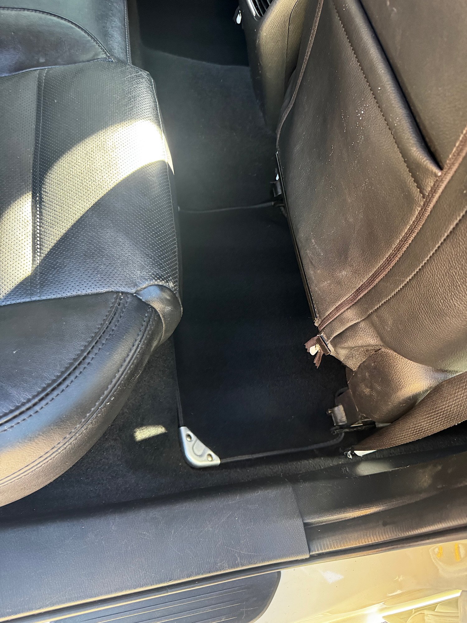 Rear carpet cleaned with pet hair removed after detailing Mazda 6