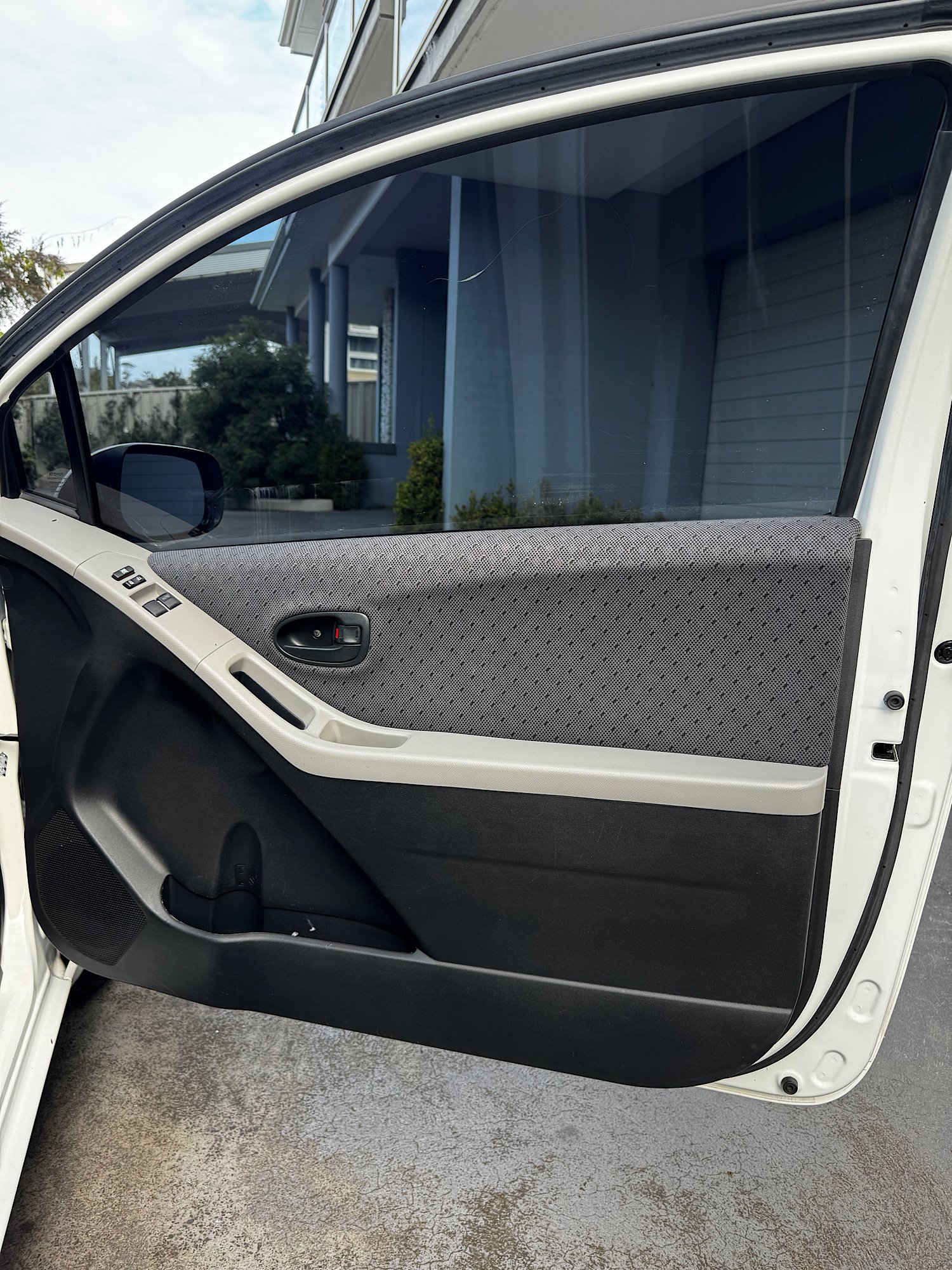 Toyota Yaris interior door panel after detailing
