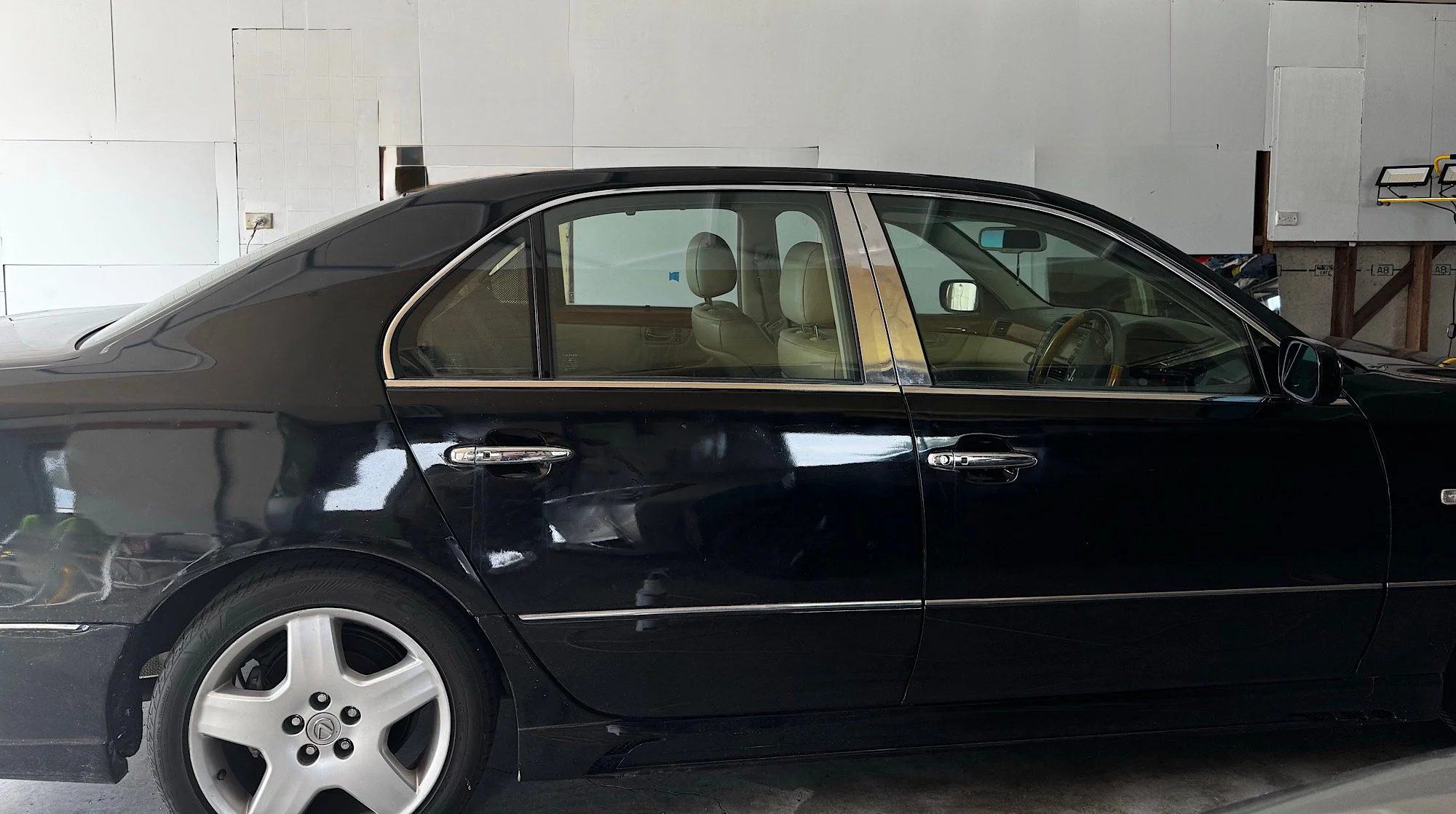 Side view of a 2005 Lexus LS 430 showing its windows before tint installation