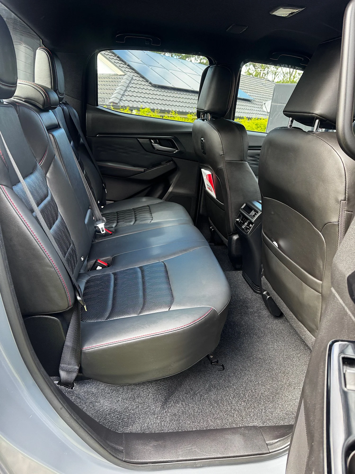 Isuzu D-Max rear interior after mini detail showing clean seats and carpets Central Coast NSW