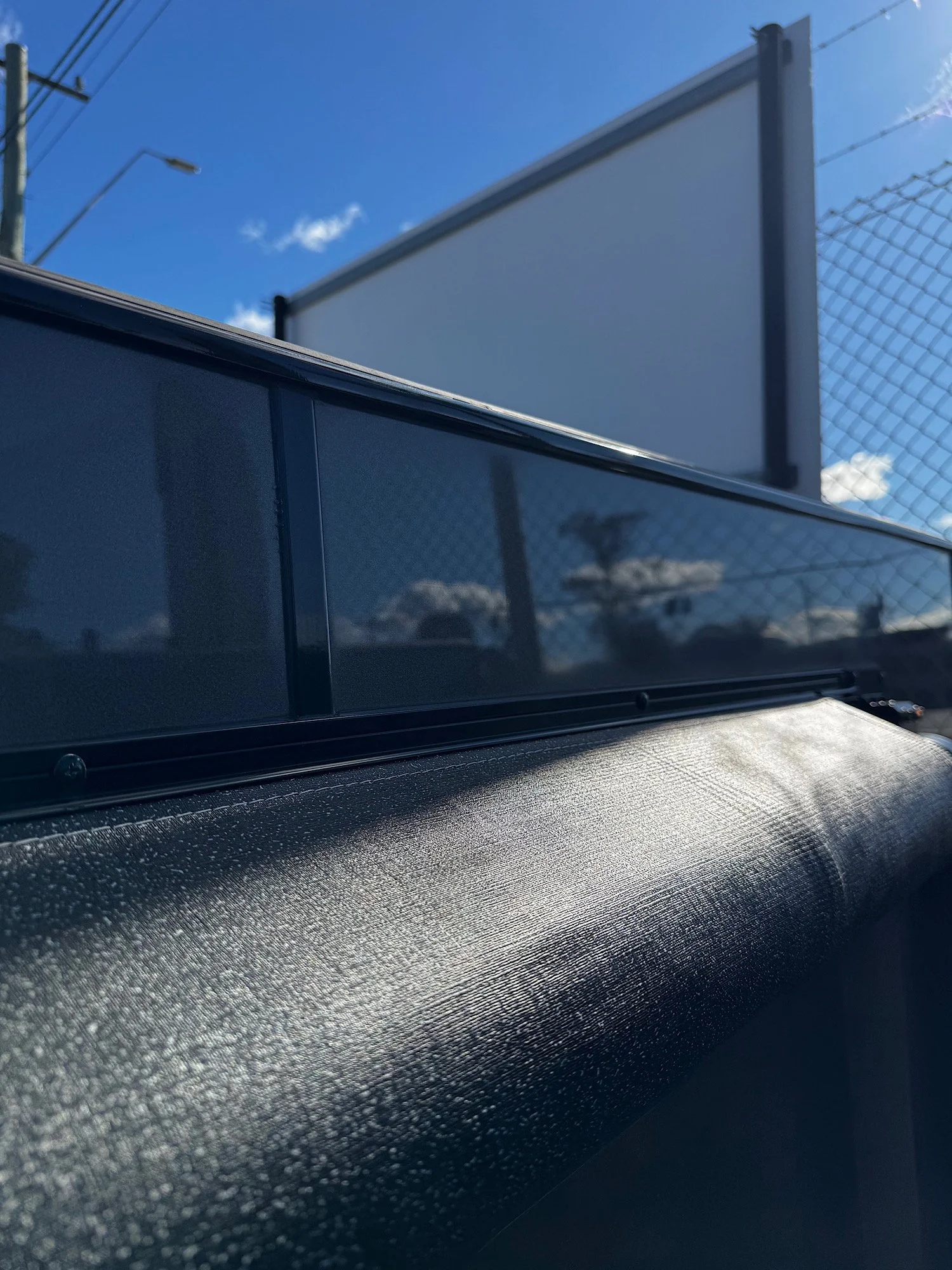 Caravan exterior after scratch correction showing improved finish in Erina NSW