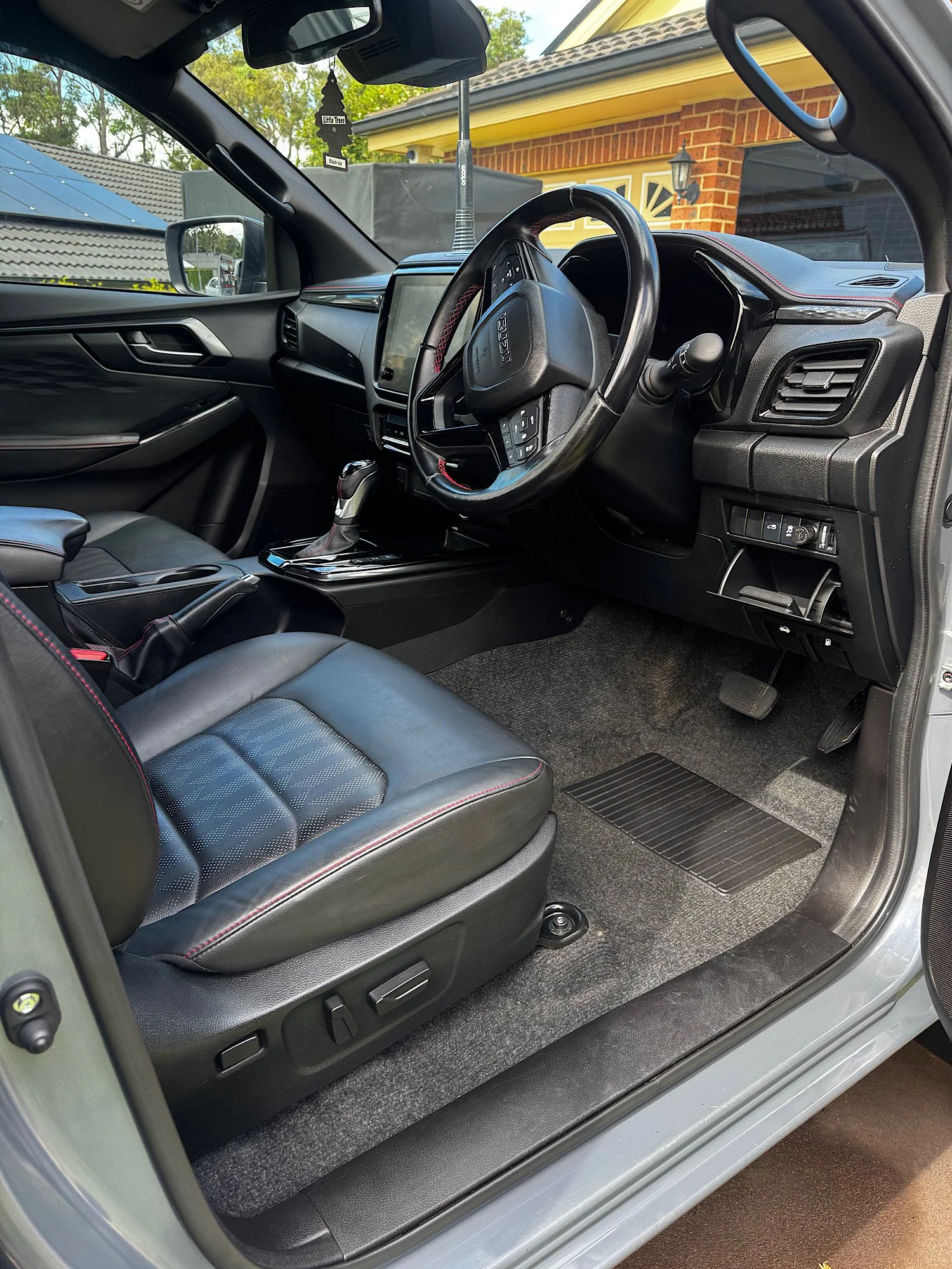 Isuzu D-Max front interior after detailing with clean dashboard and steering wheel Central Coast NSW