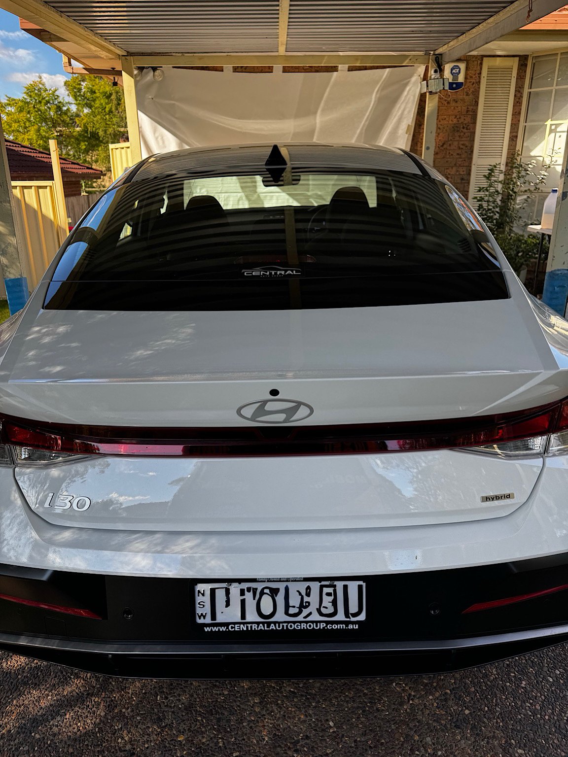 Rear view of a 2026 Hyundai i30 Hybrid before premium window tint installation on the Central Coast NSW