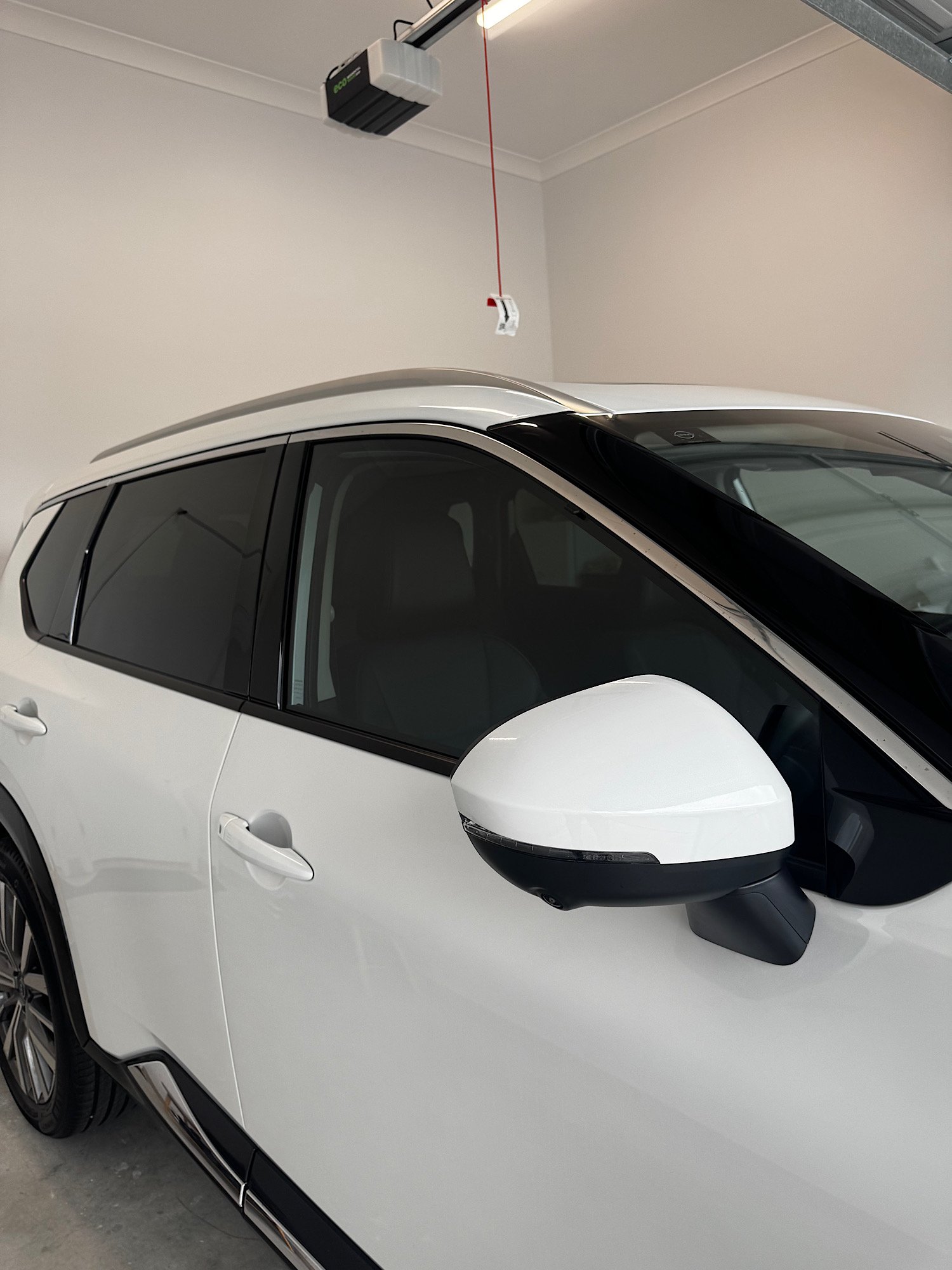 Nissan X-Trail e-4ORCE completed mobile window tint installation at client home in Hamlyn Terrace NSW