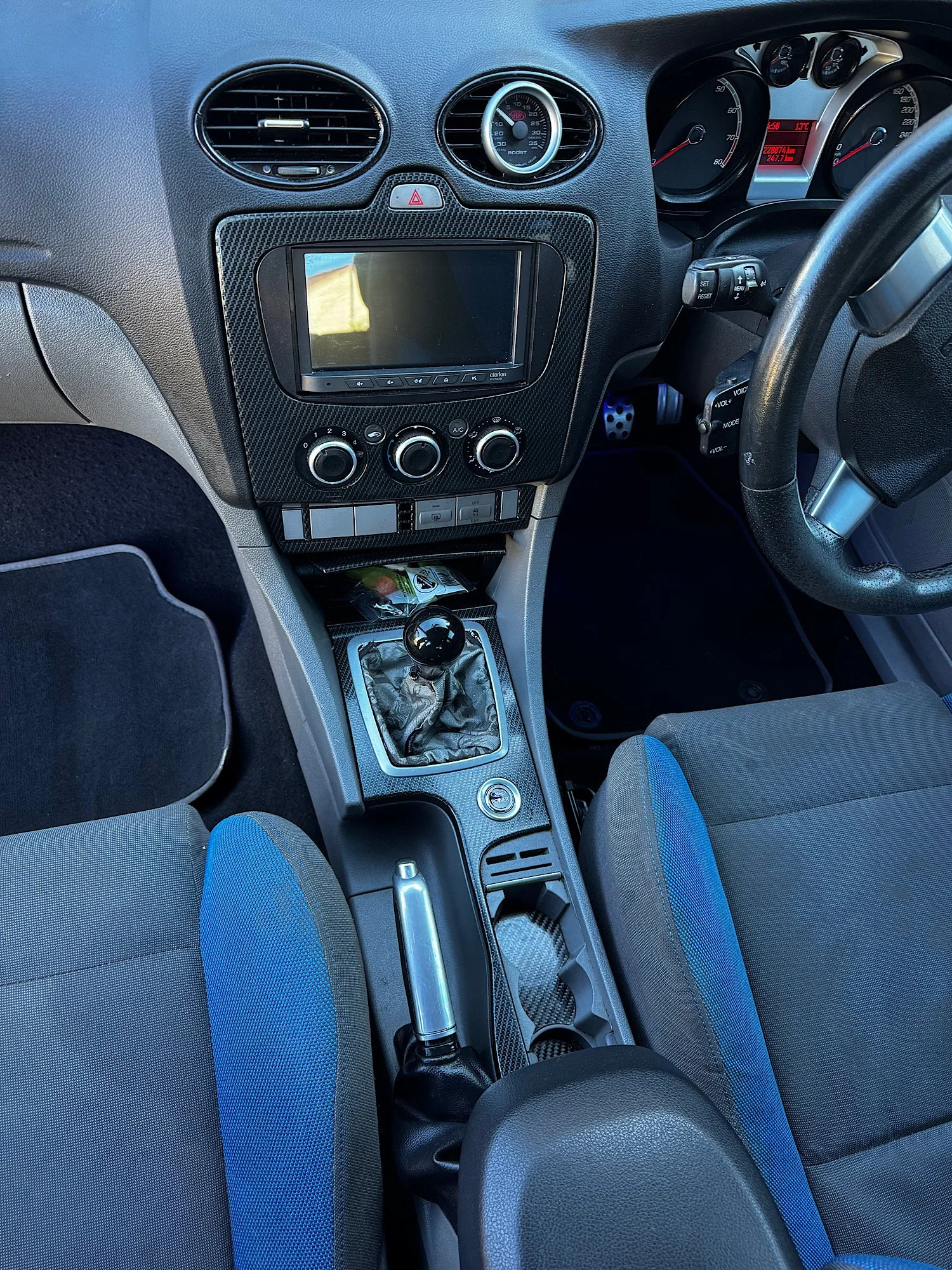Clean and refreshed centre console after interior detailing on a Ford Focus XR5 Turbo.