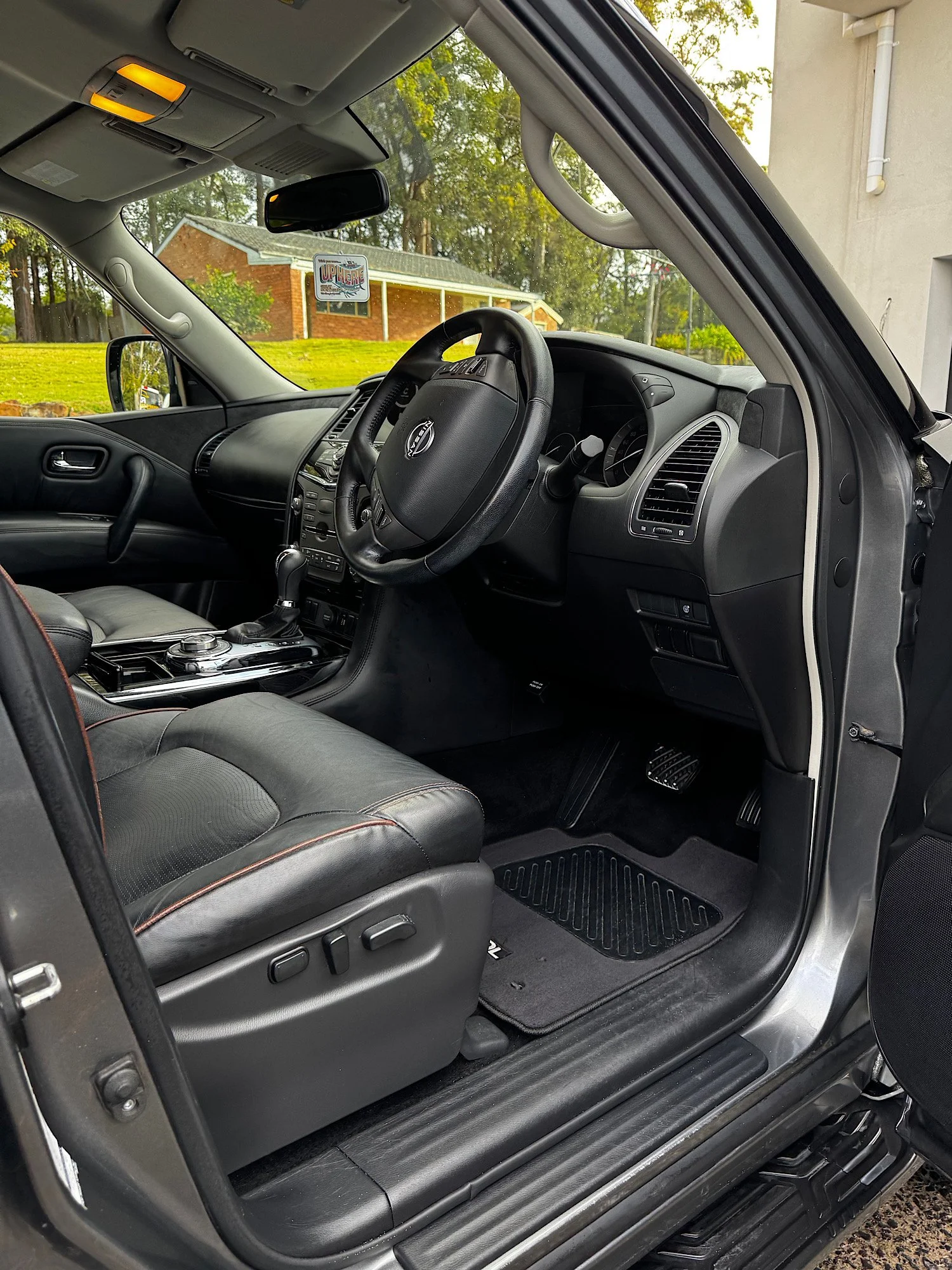 Clean driver seat and footwell after detailing Nissan Patrol Warrior interior
