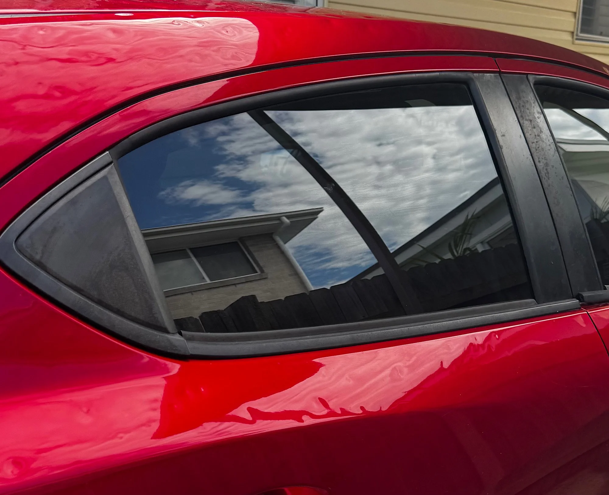 Mazda 2 Neo window tint close up smooth film finish no bubbles