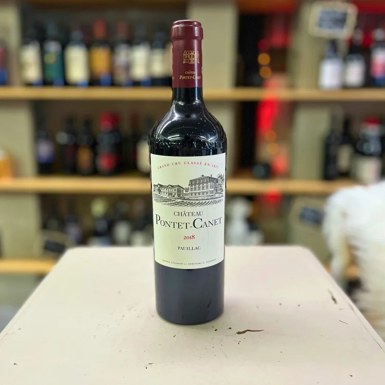 Bottle of Château Pontet-Canet 2018 on the shop counter
