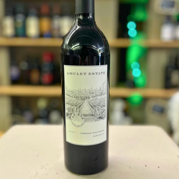 Bottle of Amulet Estate AE Cabernet Sauvignon 2022 on the shop counter