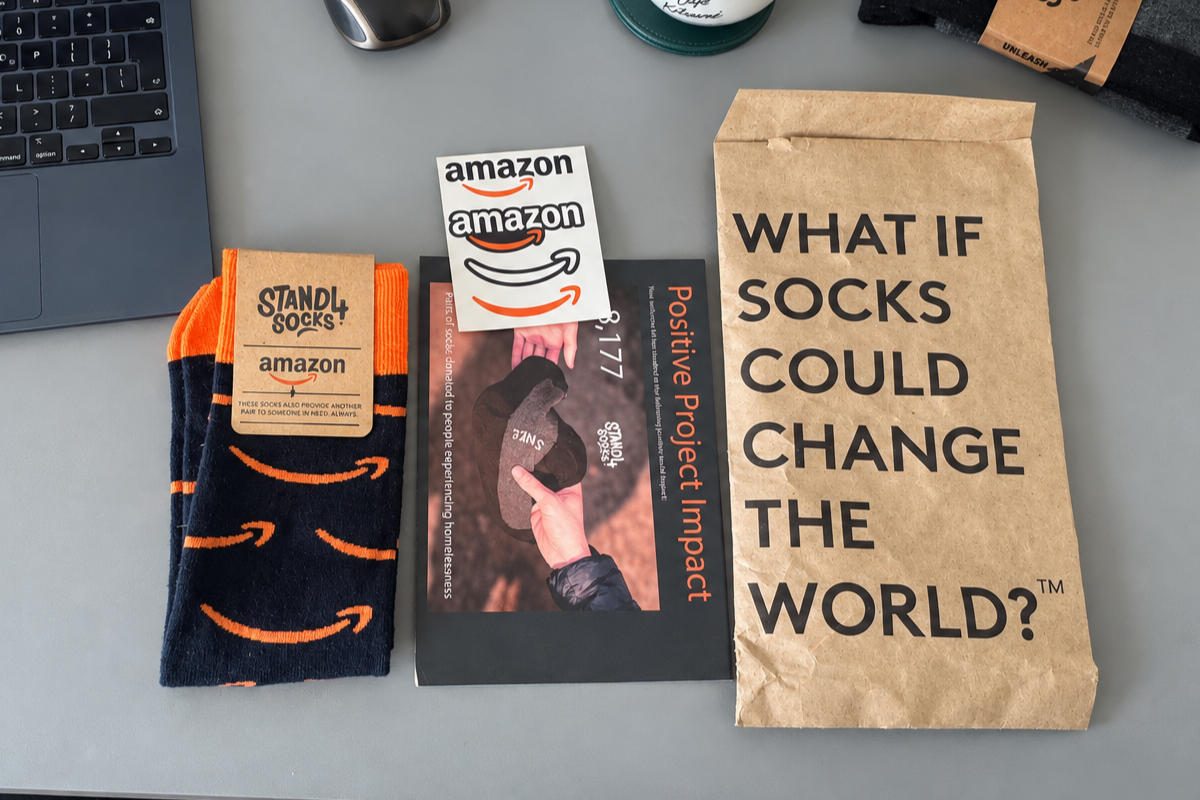 Attendee holding a pair of custom conference socks
