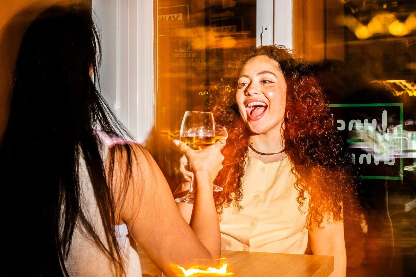 Laughing at the bar