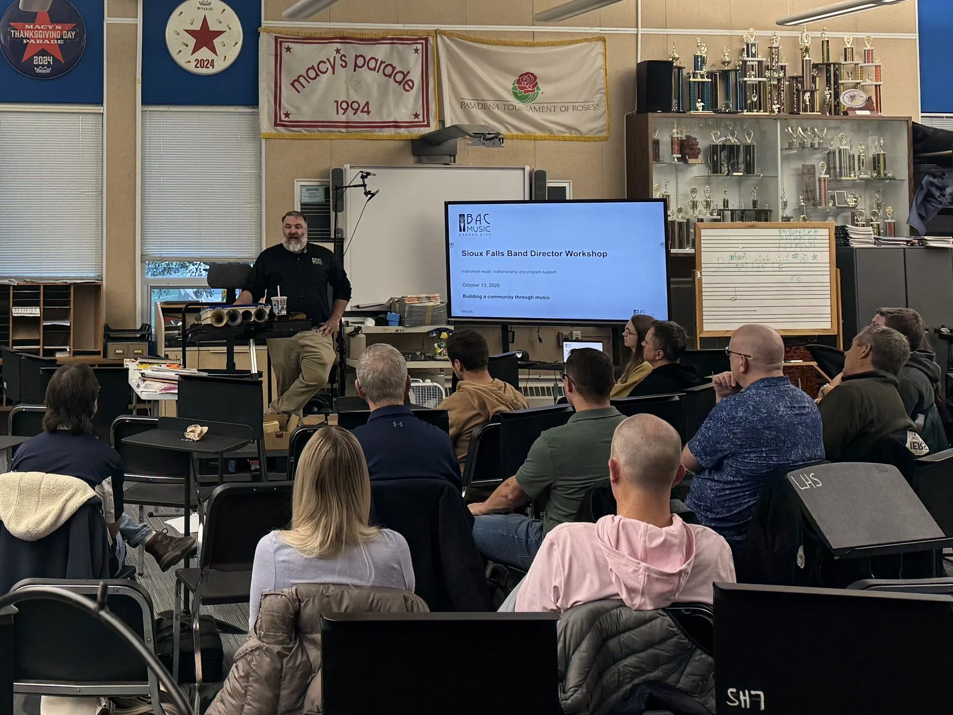 Mike presenting instrument repair and manufacturing topics to a room of band directors at a Sioux Falls workshop.