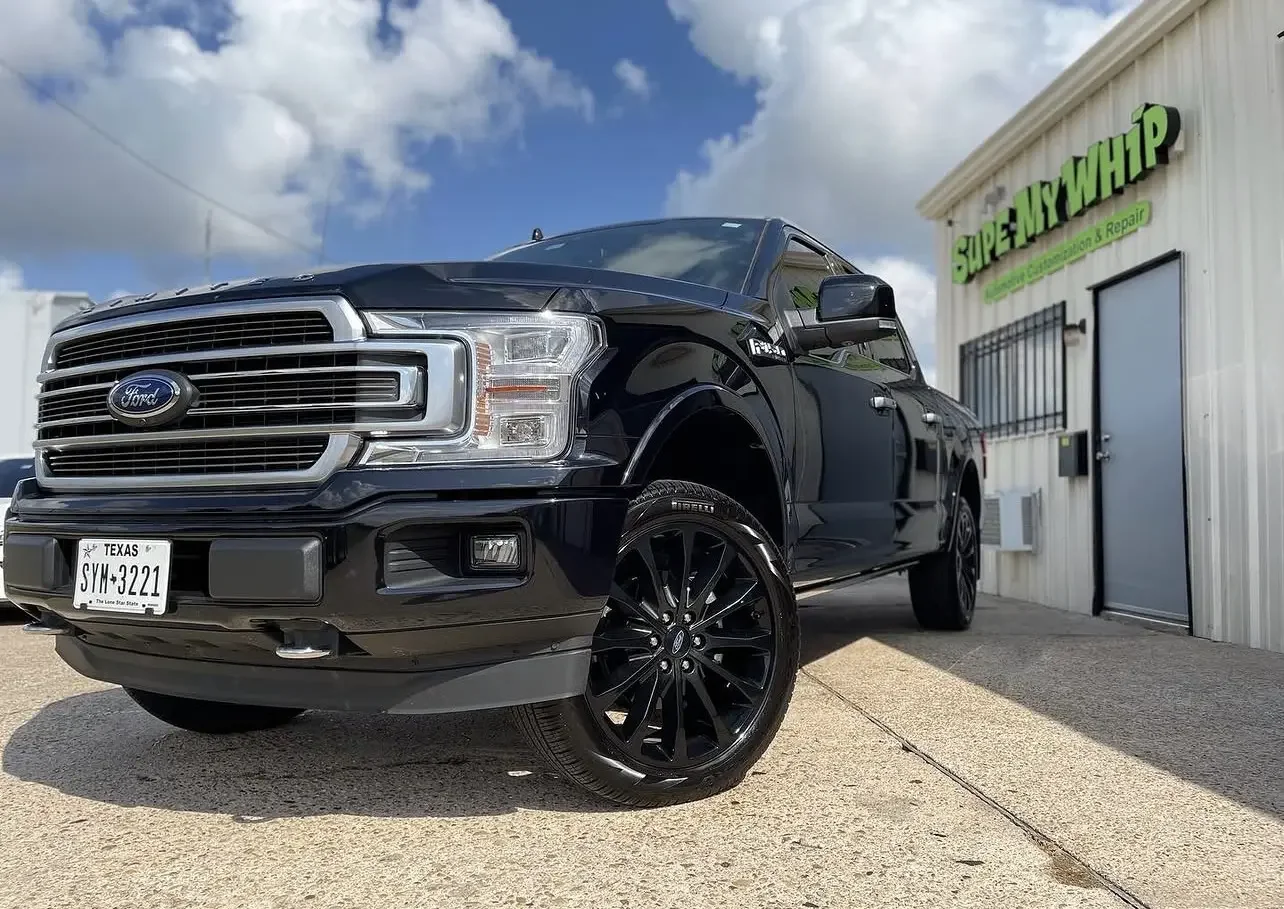 Black Ford F-150 outside Supe My Whip