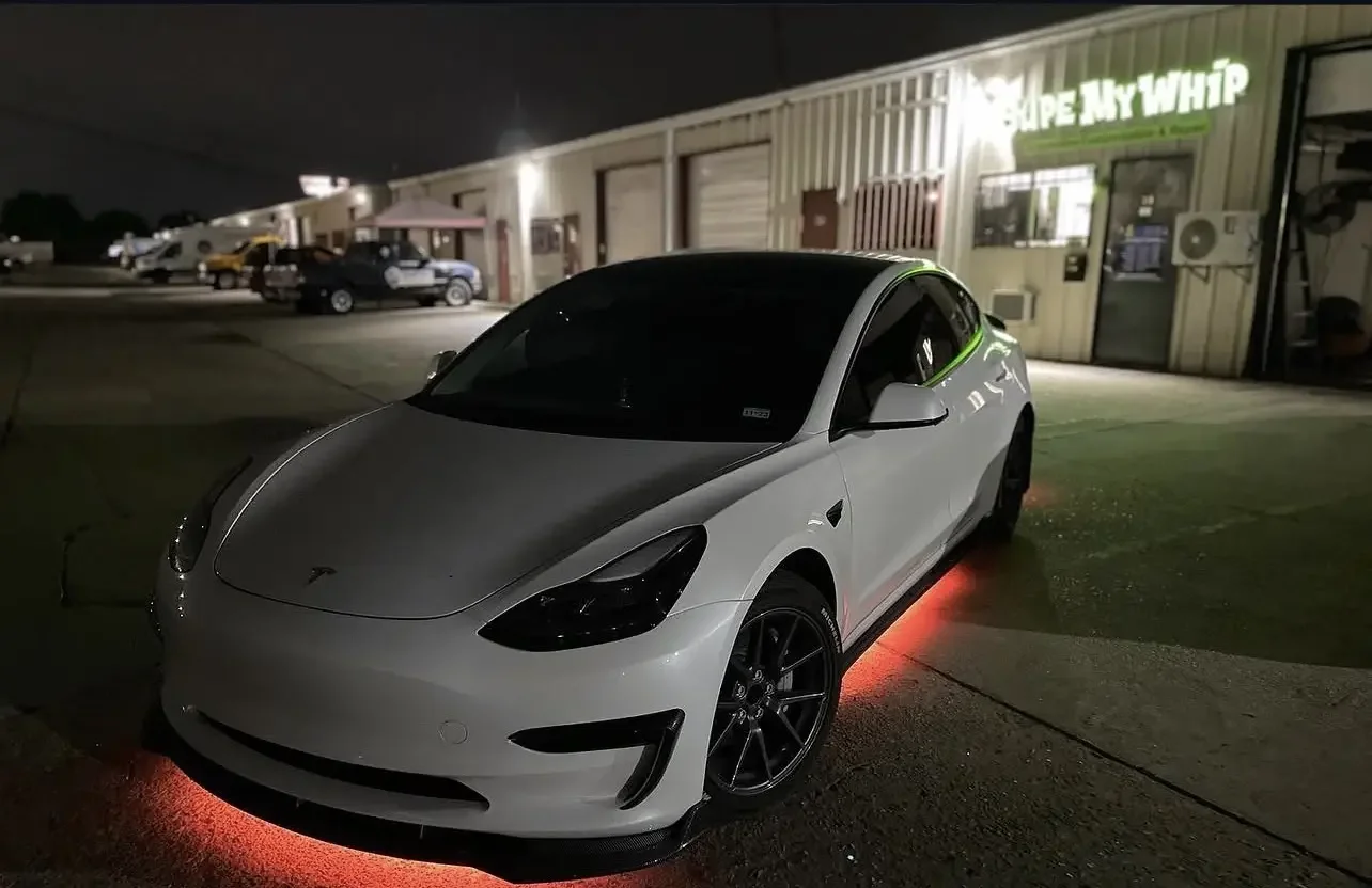 White Tesla Model Y with custom lighting
