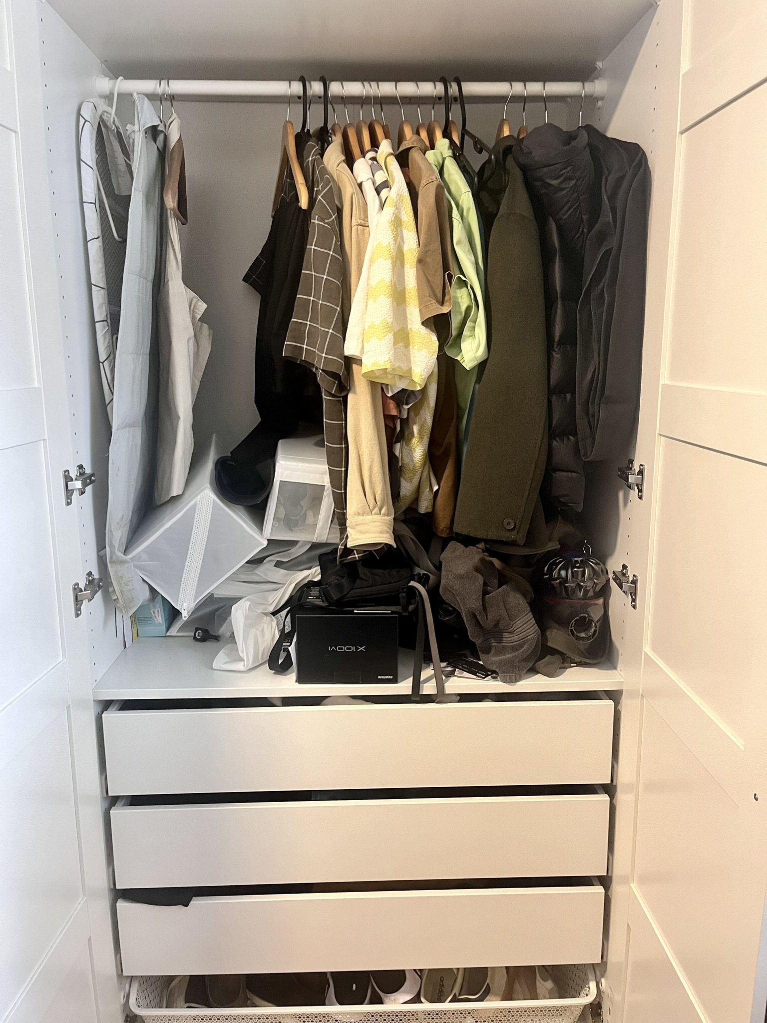 Disorganised male wardrobe before home organisation Inner West Sydney
