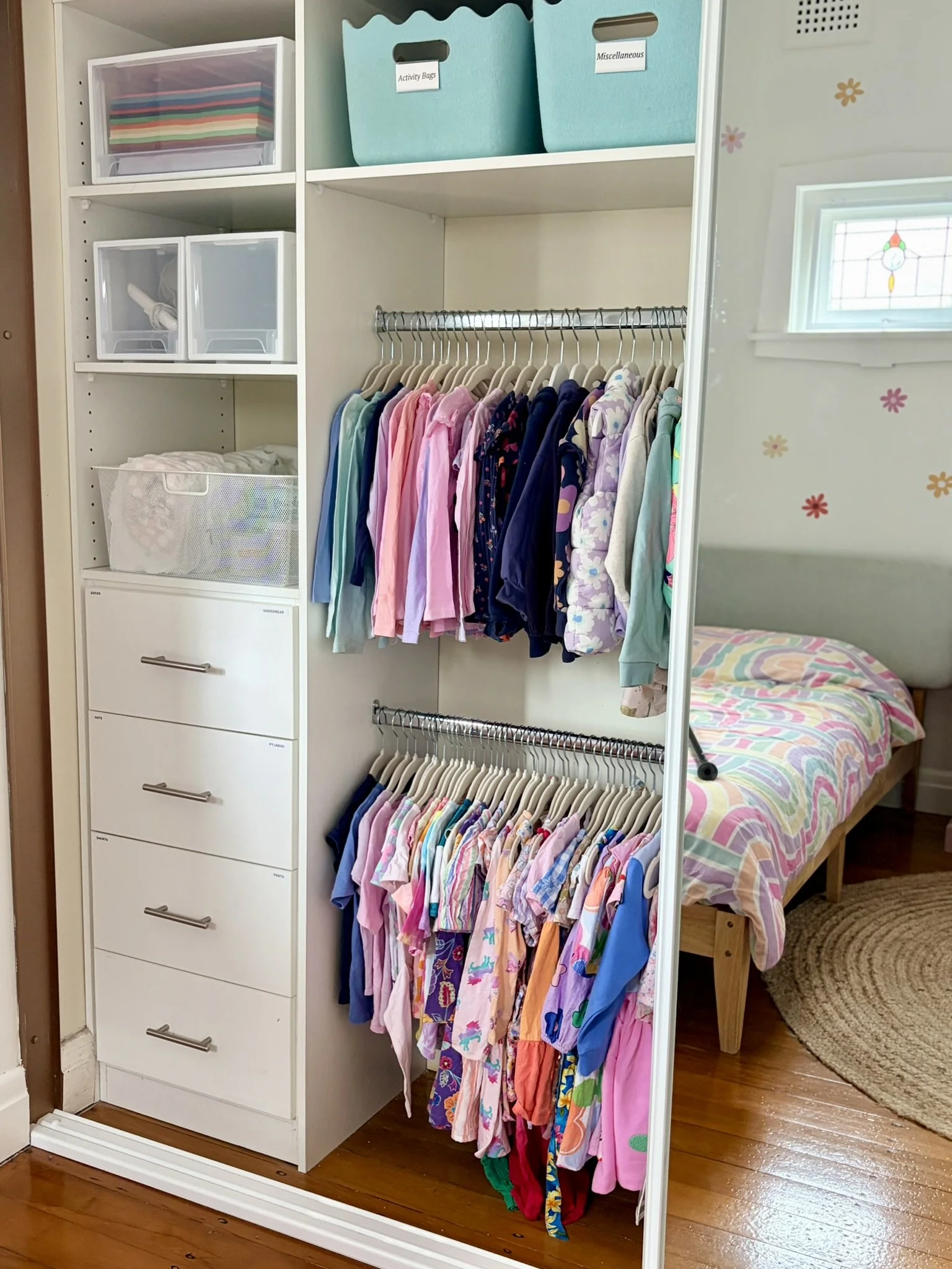 Organised male wardrobe after