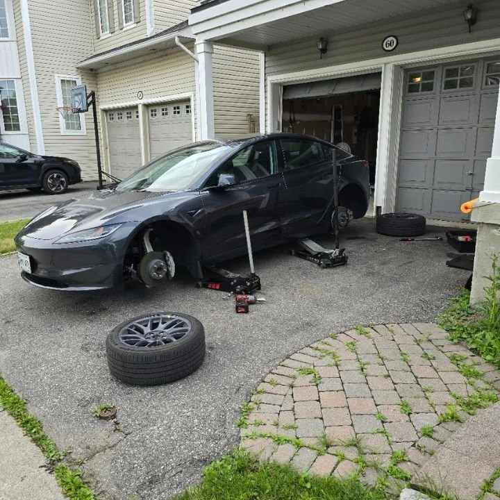 TIA certified technician performing mobile tire rotation on-site