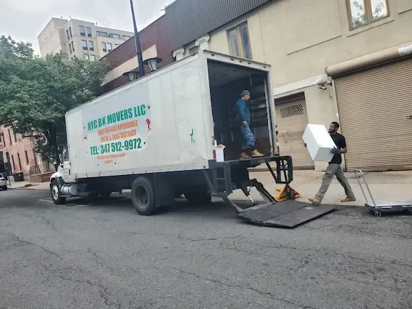 NYC Brooklyn Movers LLC loading truck on Brooklyn street