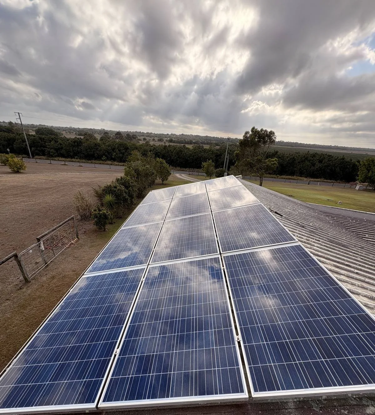 Sparkling clean solar panels reflecting the sky after a SunWise solar clean near Bundaberg
