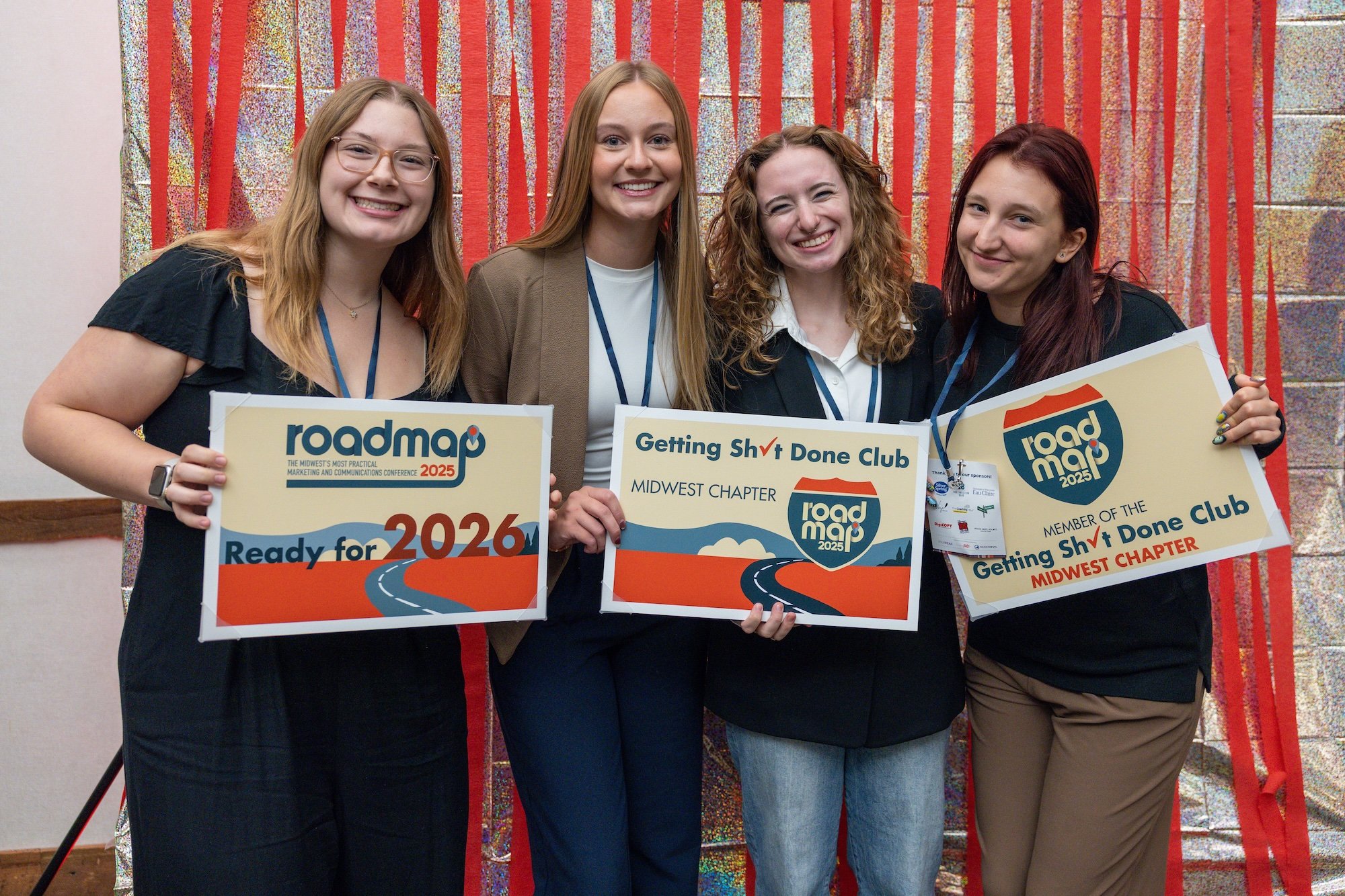 Attendees holding Roadmap signs