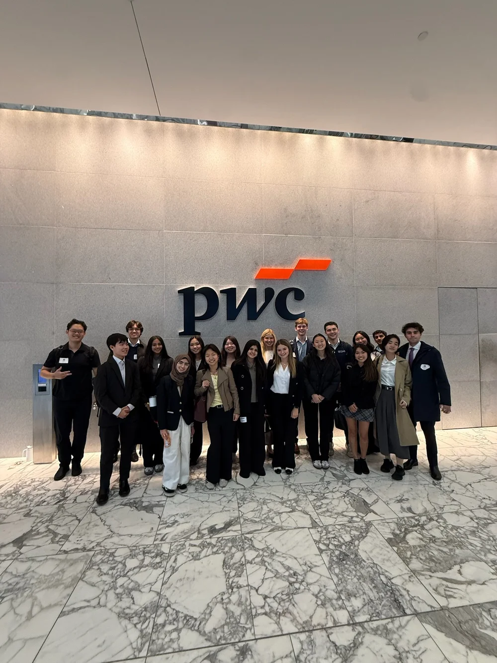 WUCC members in the PwC lobby during a career trek