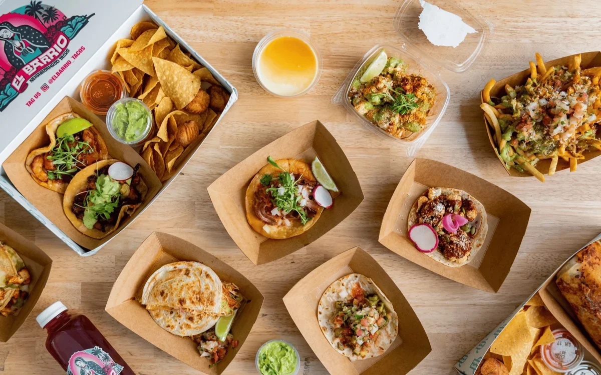 An overhead selection of El Barrio Neighborhood Tacos food
